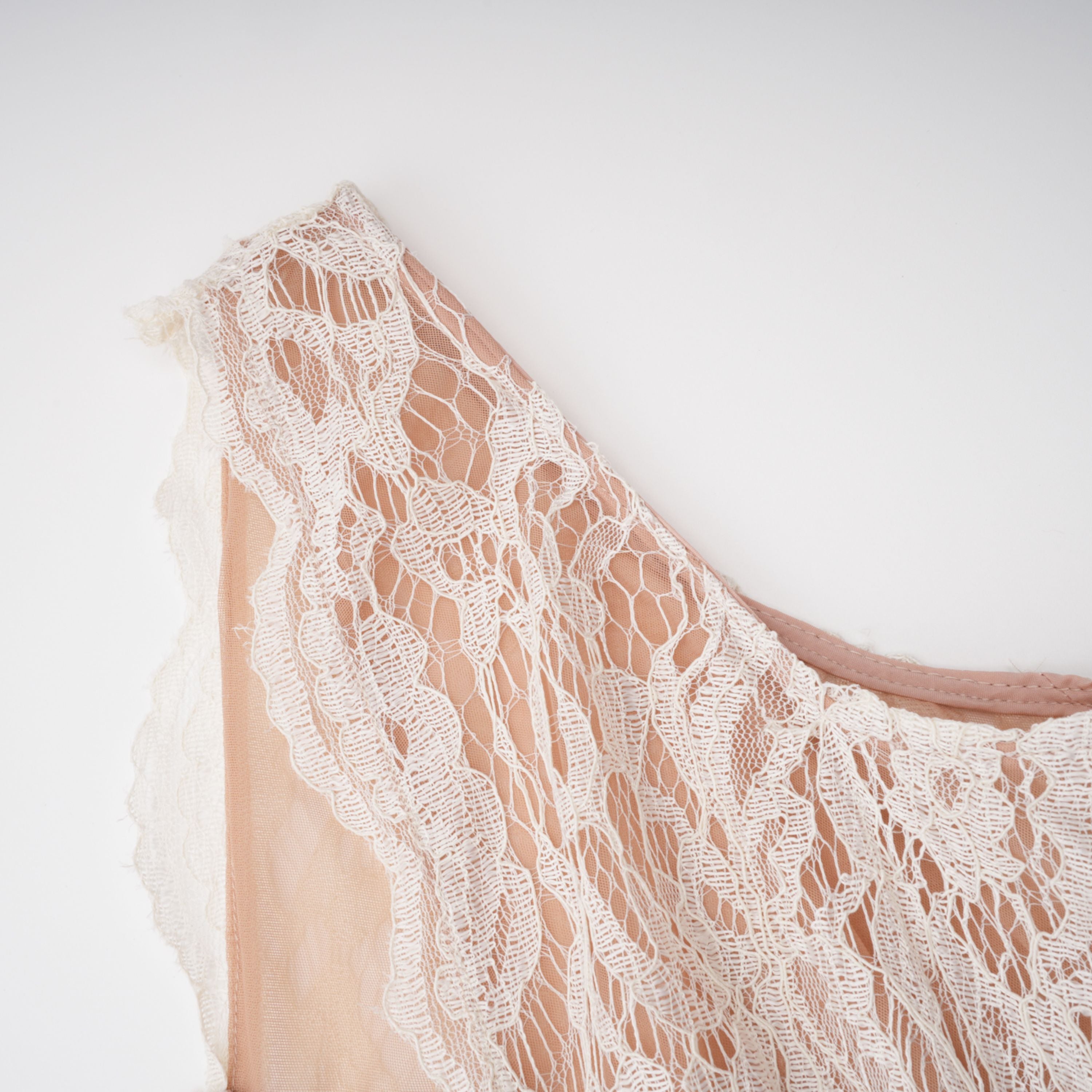 White lace midi dress with a keyhole neckline and a flared skirt over a nude lining