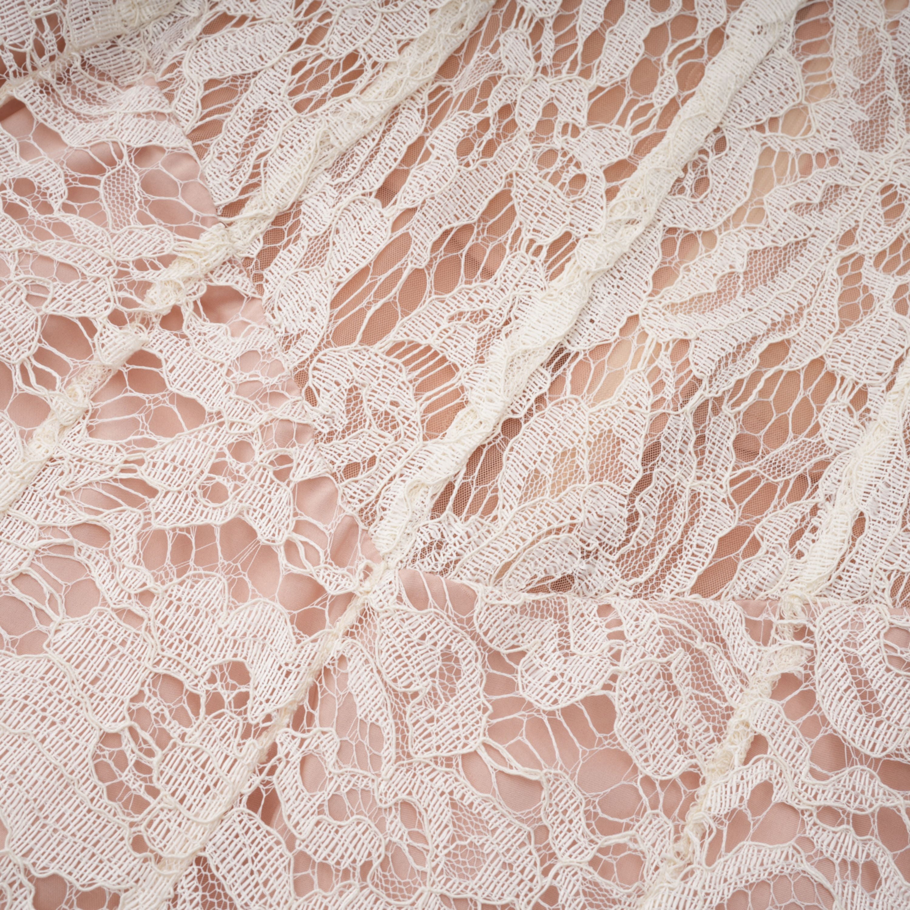White lace midi dress with a keyhole neckline and a flared skirt over a nude lining