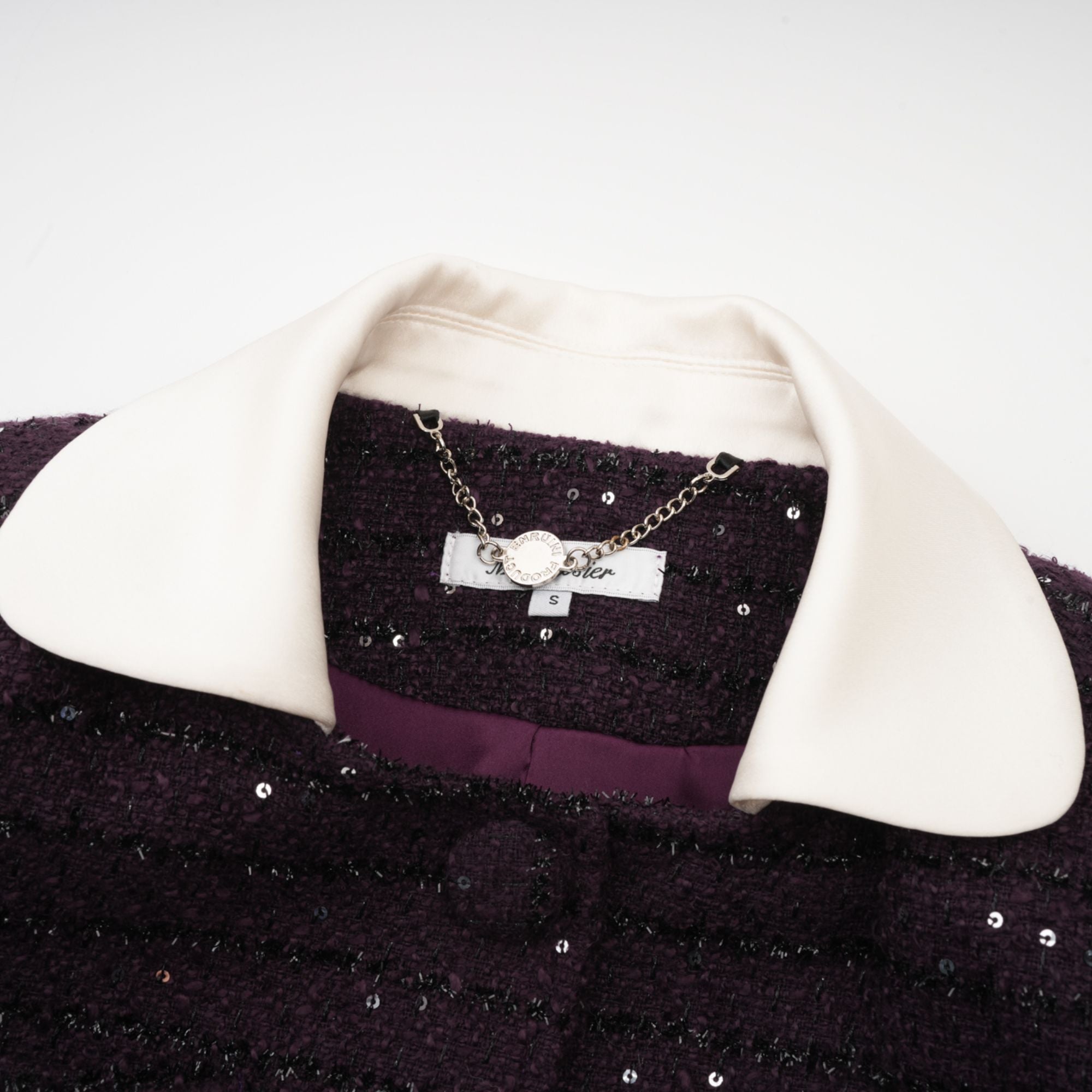 Purple tweed jacket and mini skirt set