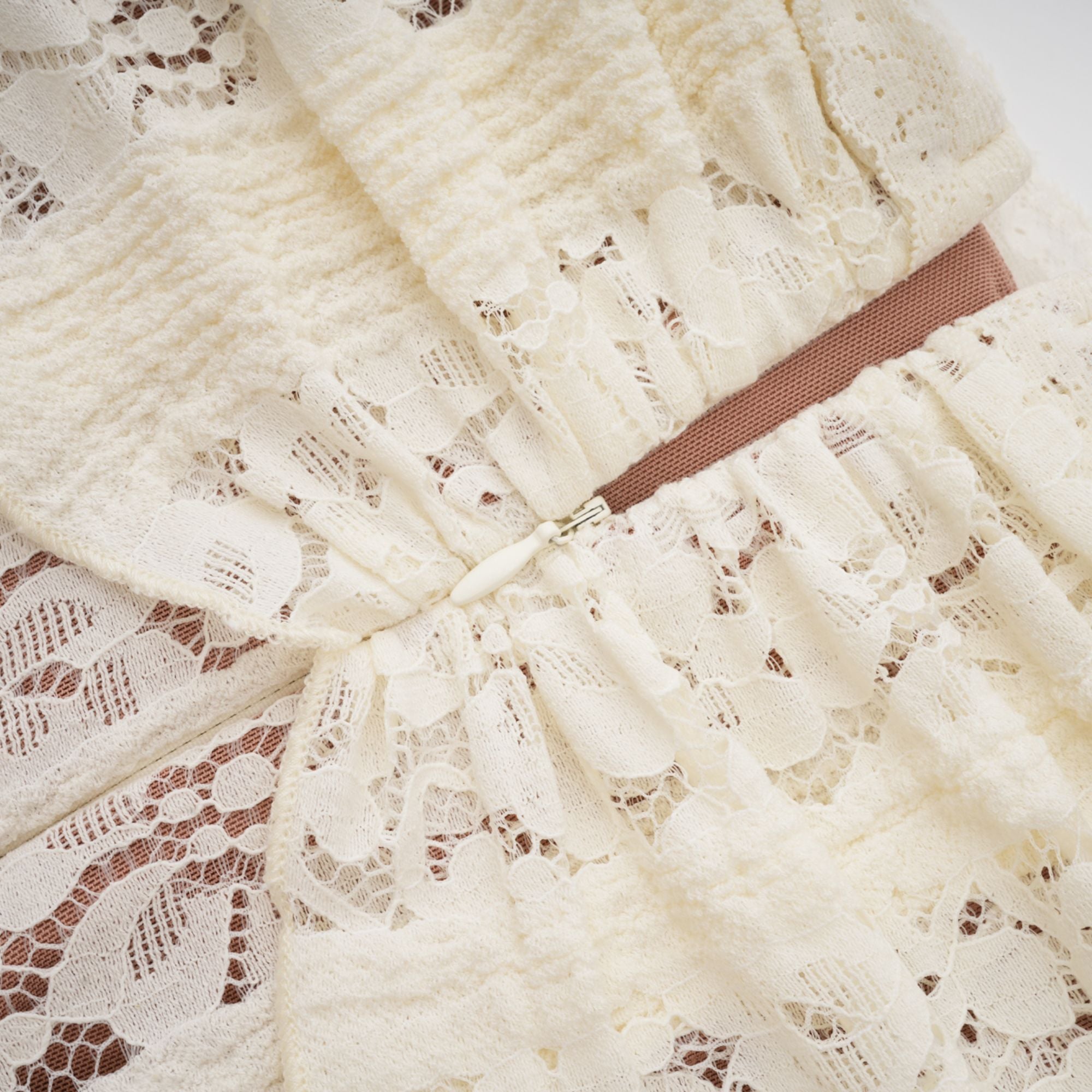 Cream off-the-shoulder lace gown with long bell sleeves