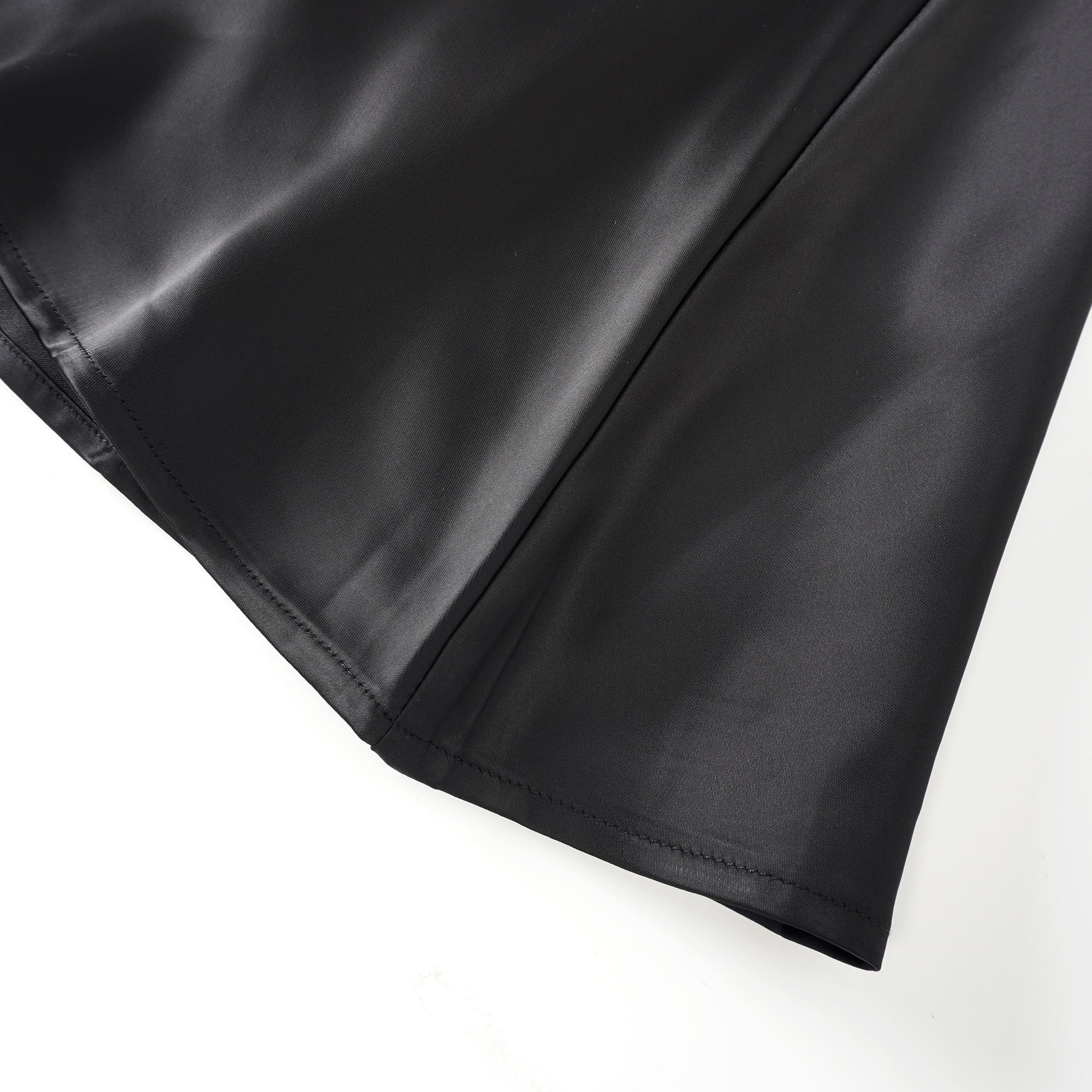 Black blazer paired with a black satin maxi skirt