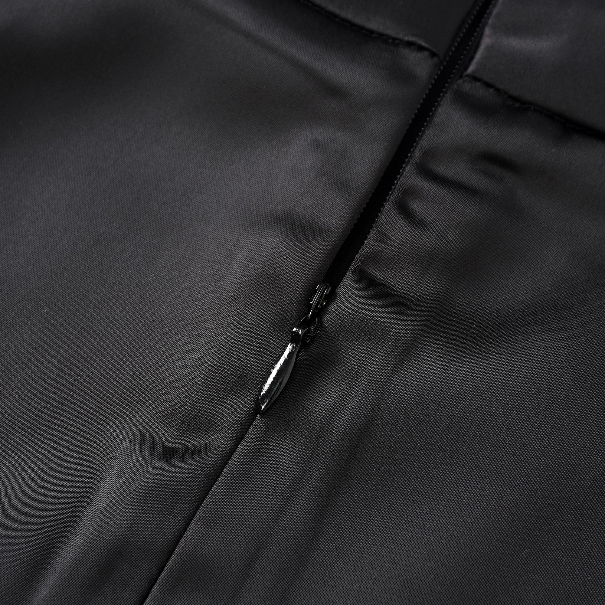 Black blazer paired with a black satin maxi skirt