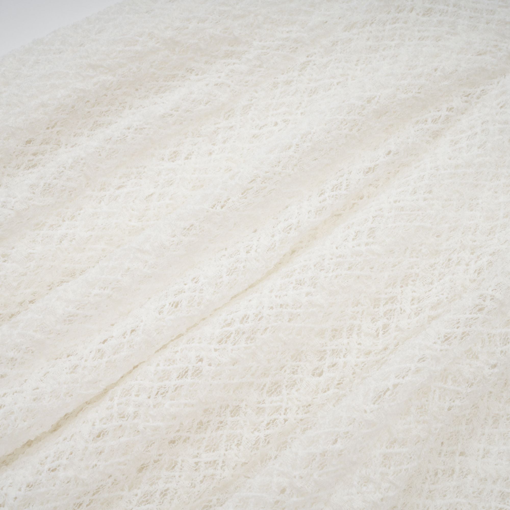 White long-sleeve textured knit gown with a high neck