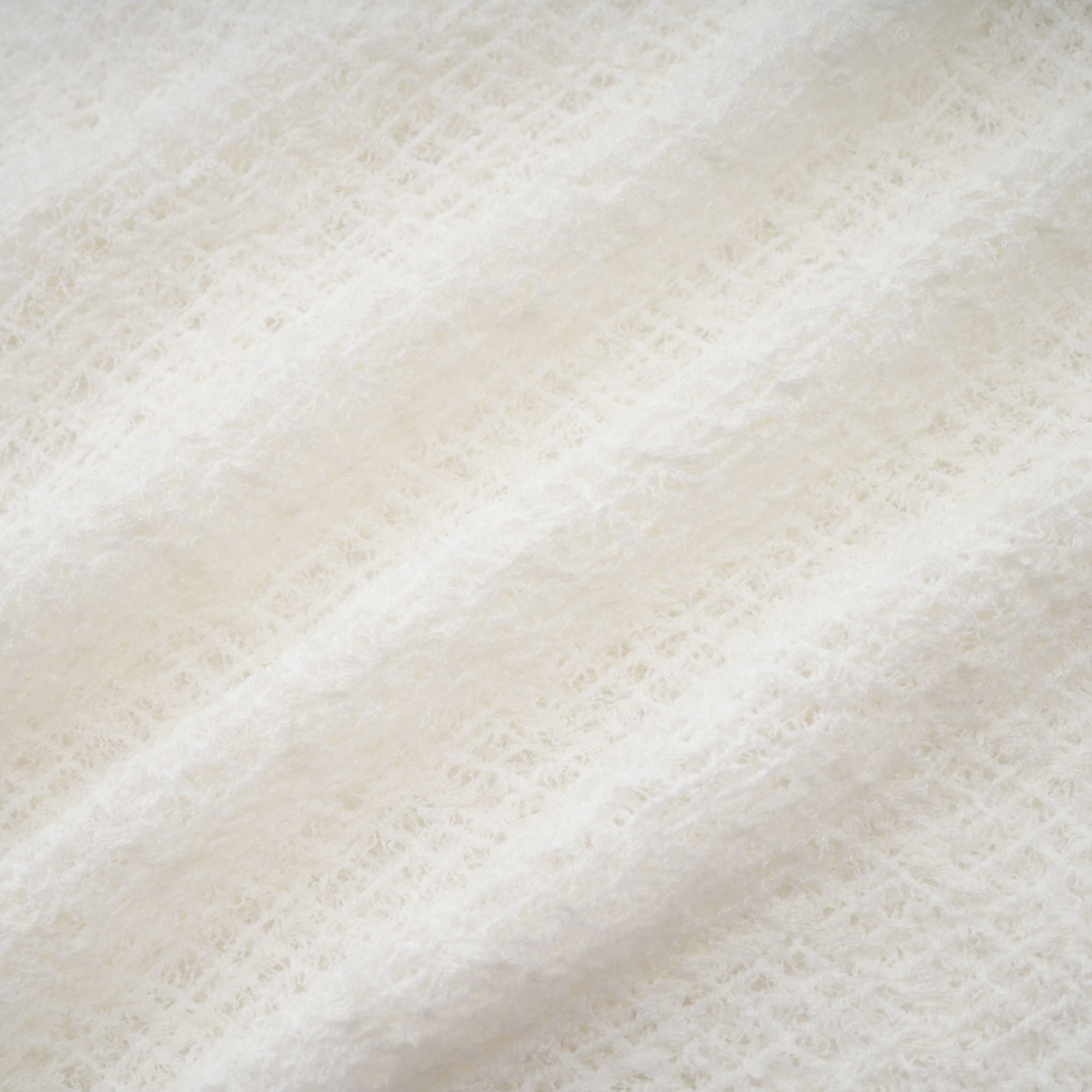 White long-sleeve textured knit gown with a high neck