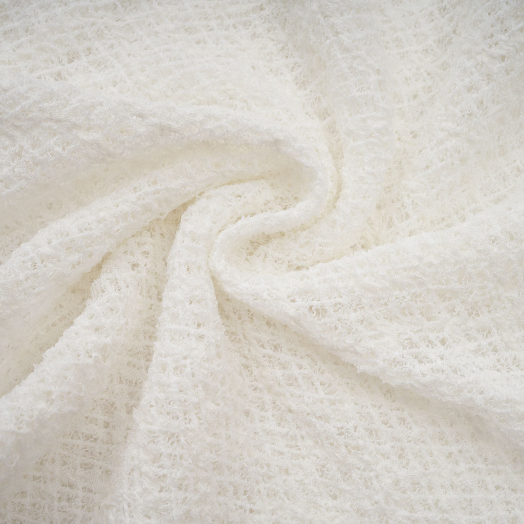 White long-sleeve textured knit gown with a high neck