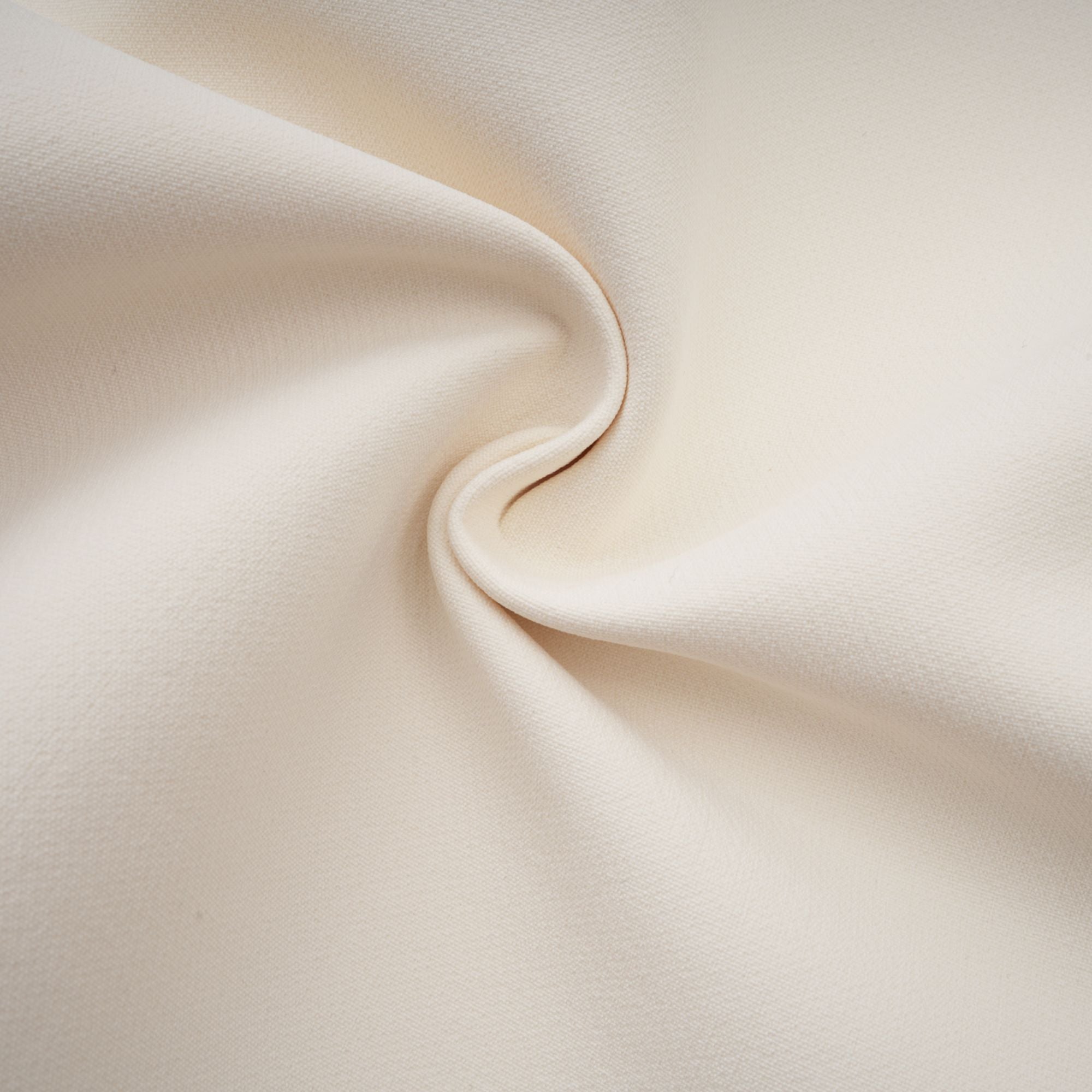 Cream strapless mini dress with a draped cape