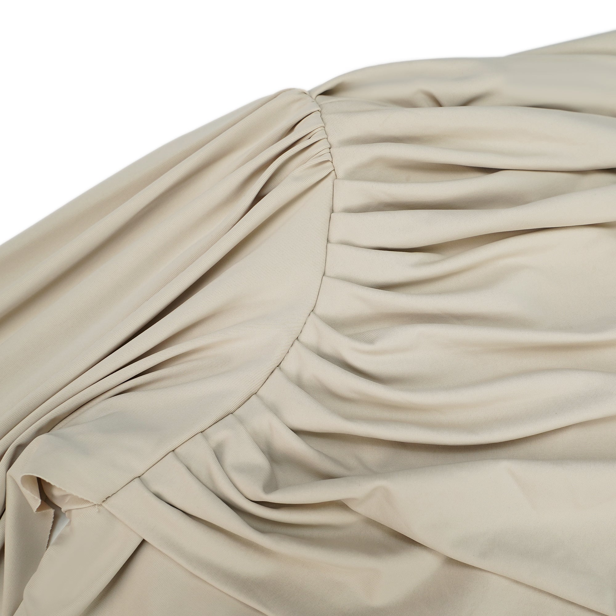 Beige long-sleeve maxi dress with a draped bodice and floor-length cape panel