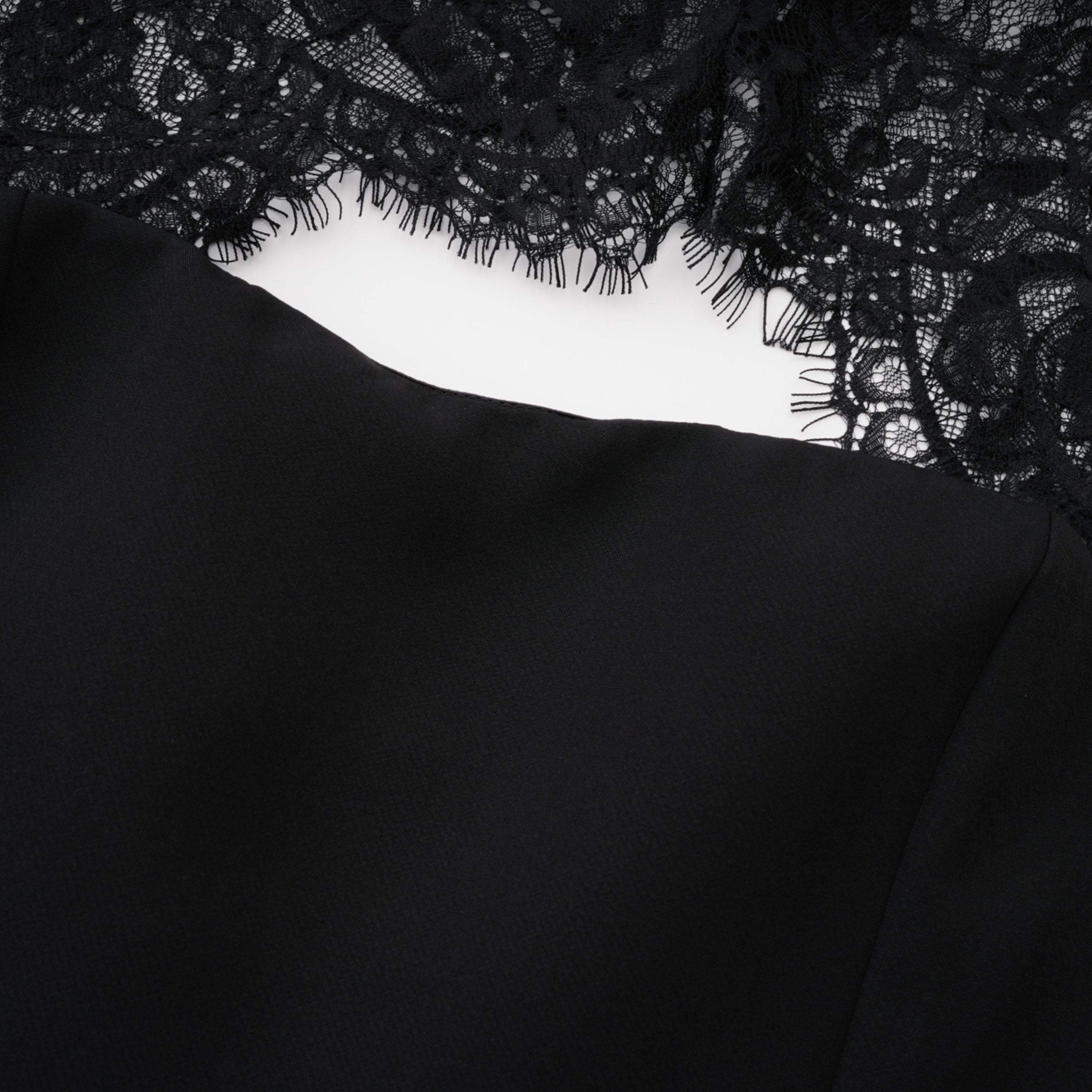 Black sweetheart maxi dress with a sheer lace high-neck overlay and long sleeves