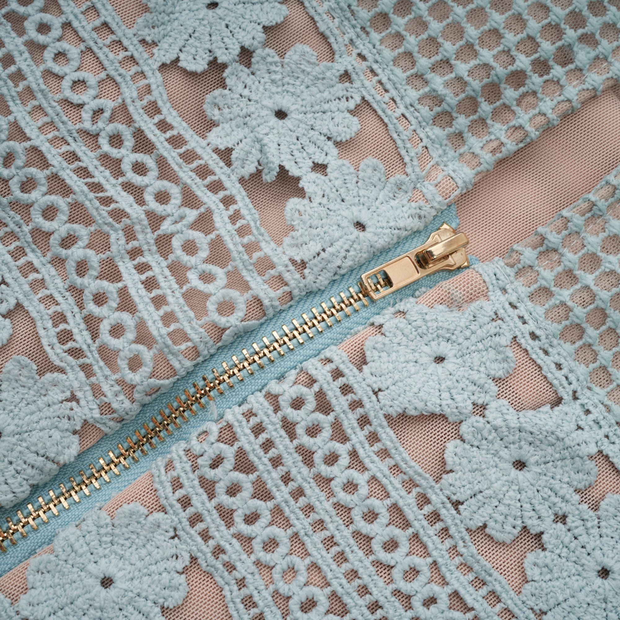 Light blue short-sleeve lace midi dress with a tiered skirt