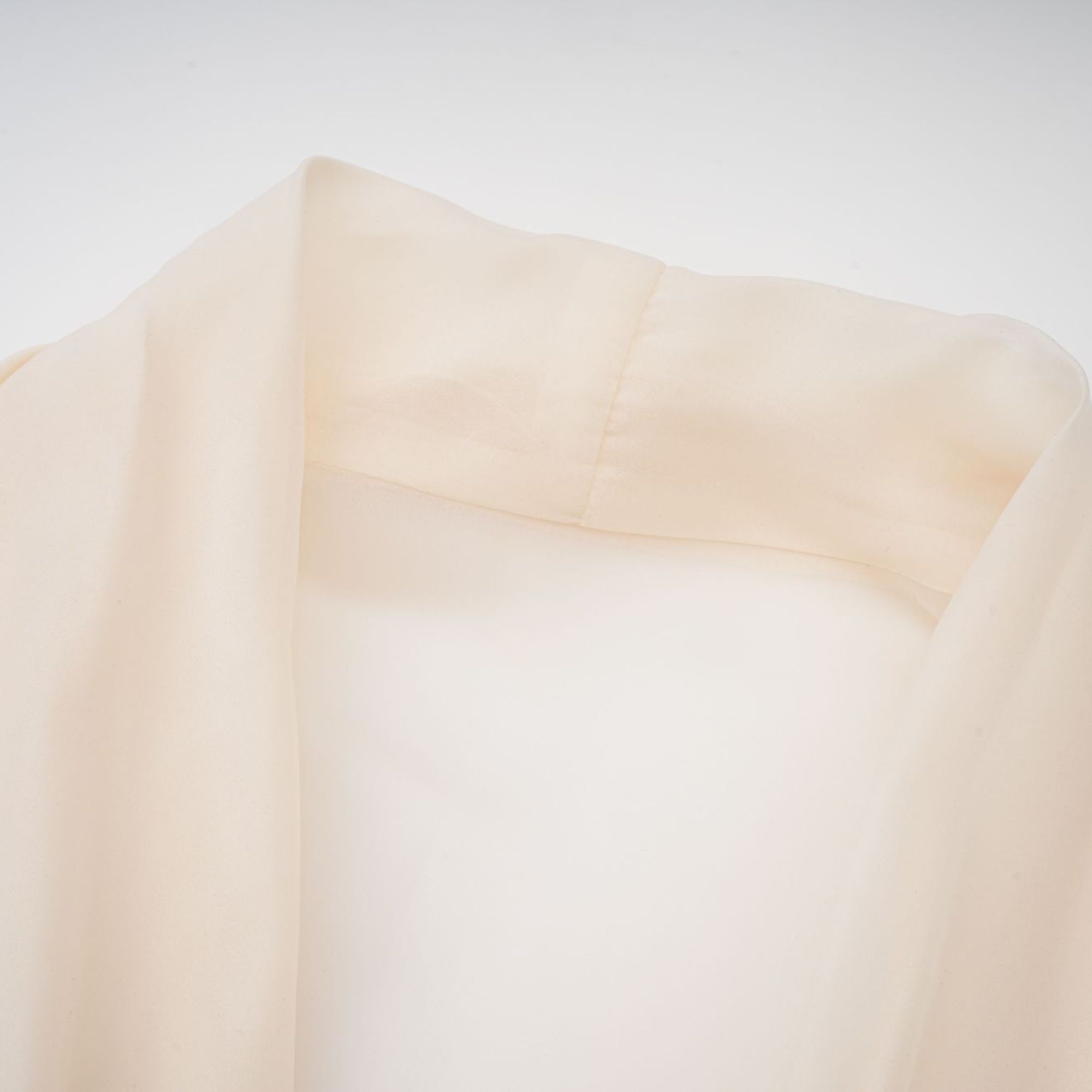 Cream long-sleeve midi dress with a balloon hem