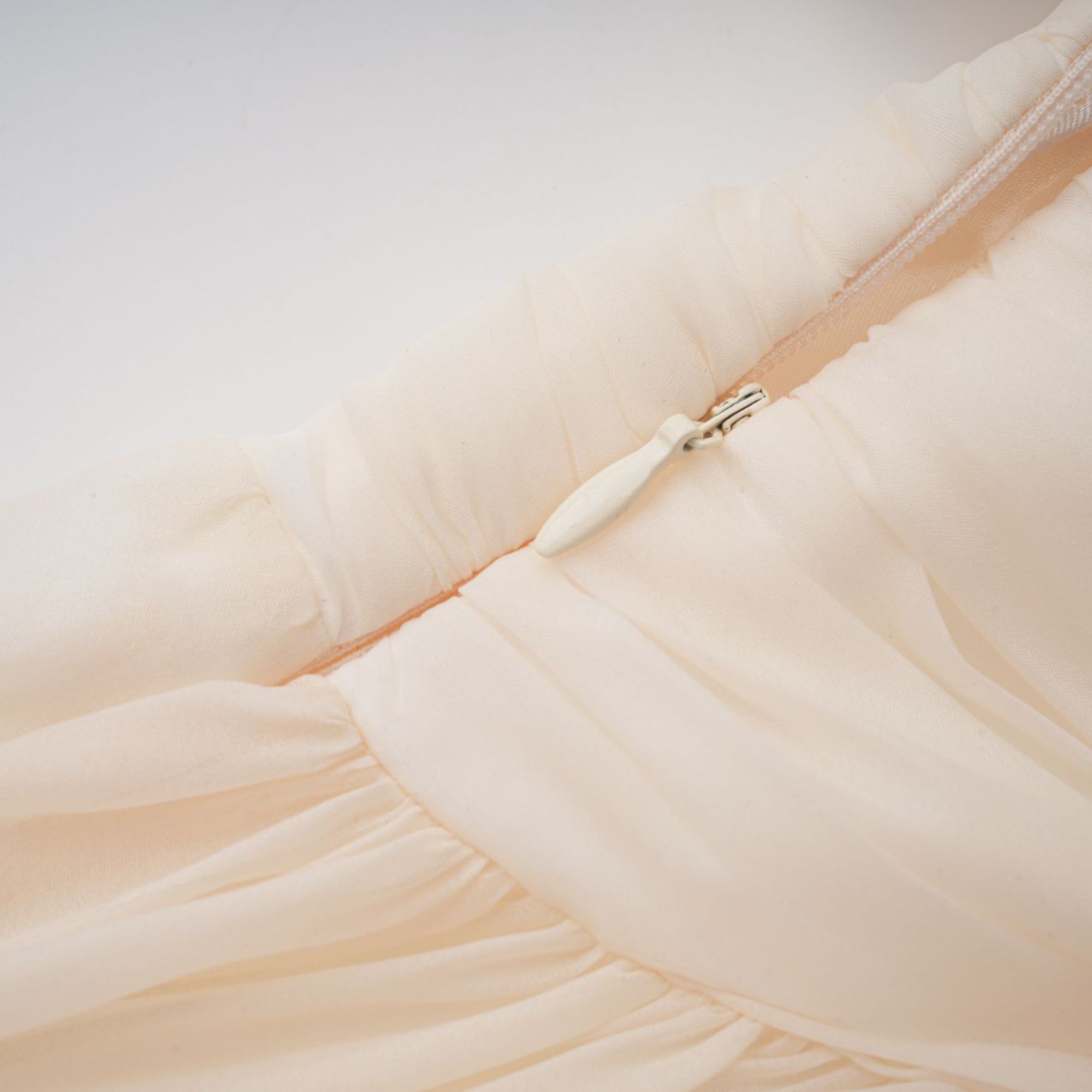 Cream long-sleeve midi dress with a balloon hem