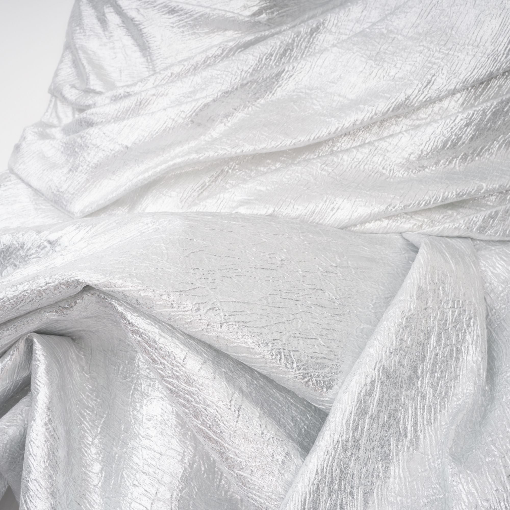 Metallic silver strapless gown with high slit
