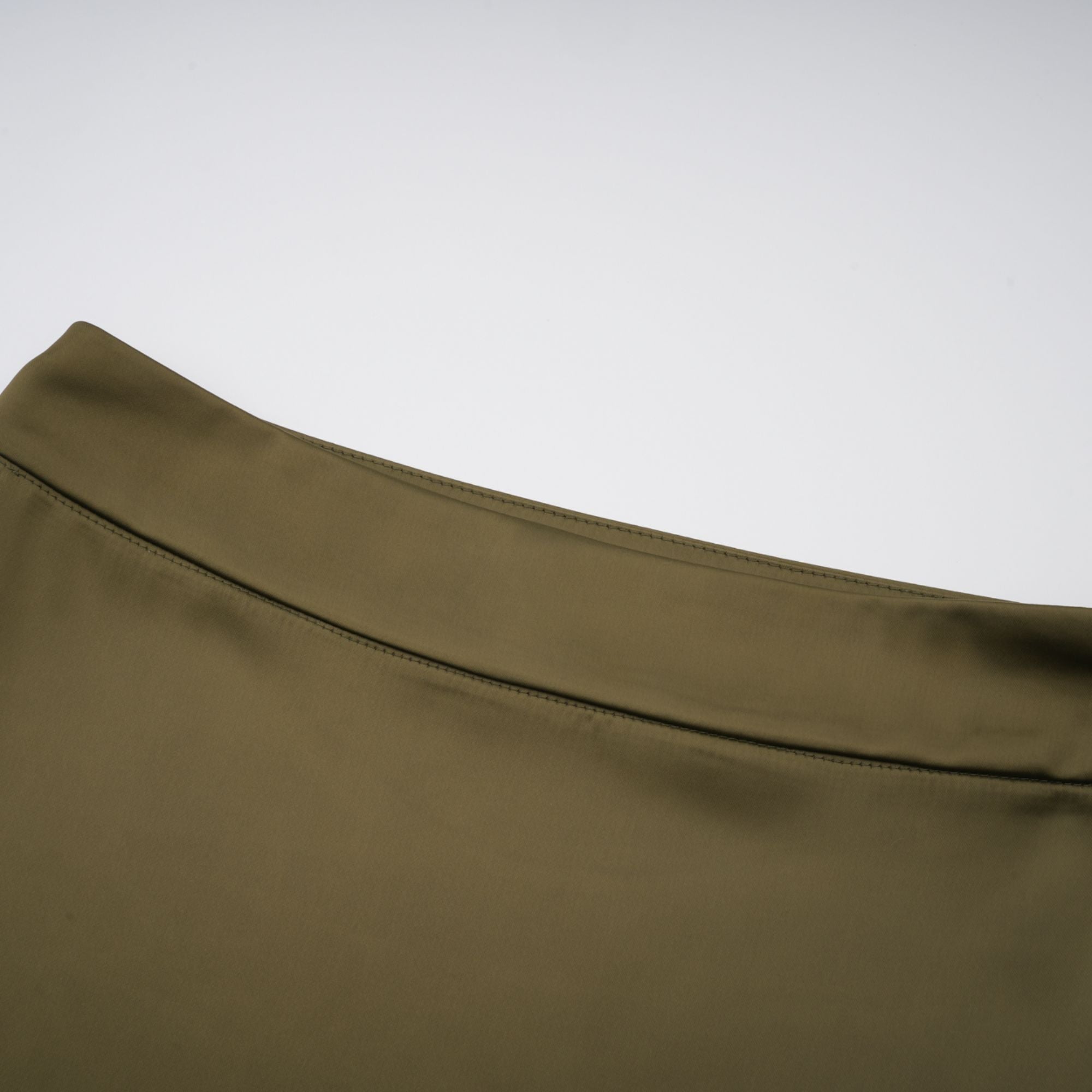 Olive green sleeveless maxi dress with a satin skirt
