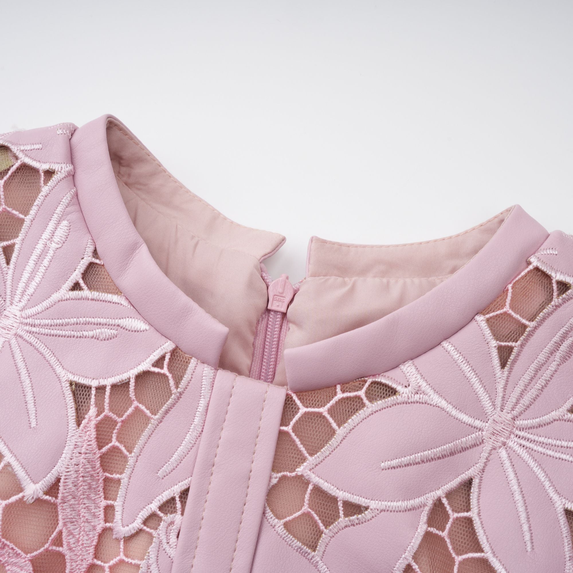 Pink floral laser-cut midi dress with short sleeves and a high neckline