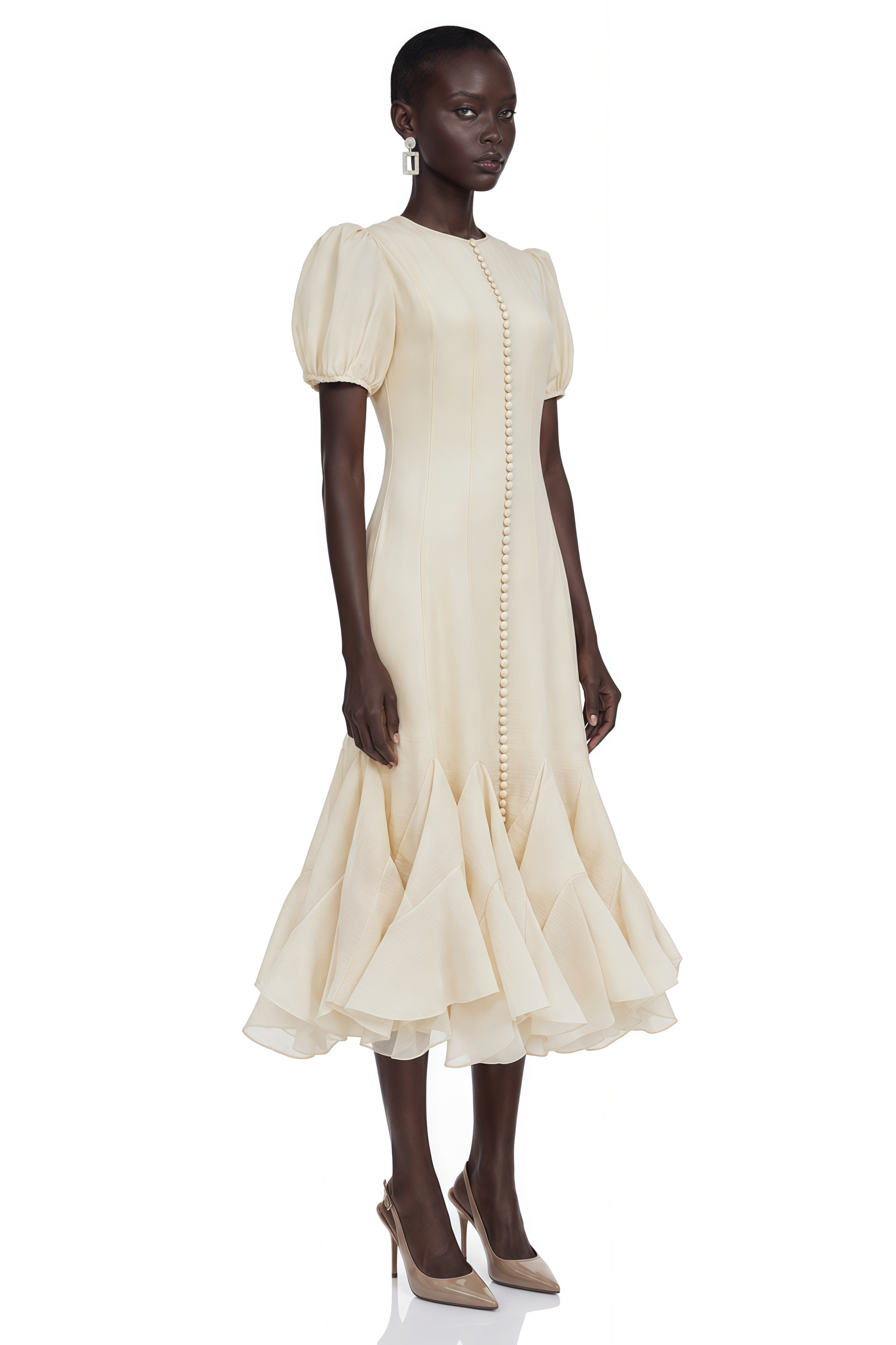 Cream button-down dress with puff sleeves and a ruffled handkerchief hem