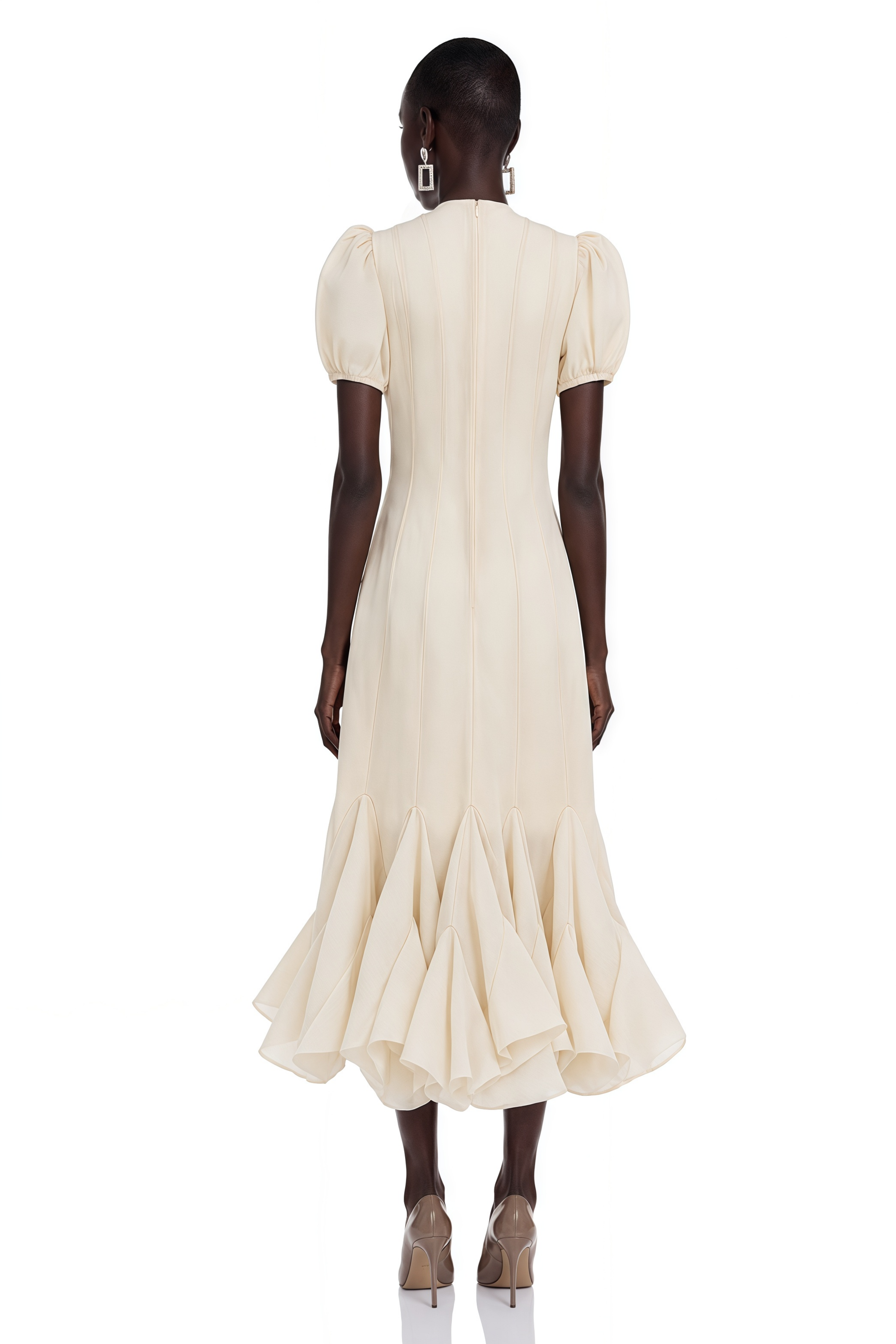 Cream button-down dress with puff sleeves and a ruffled handkerchief hem