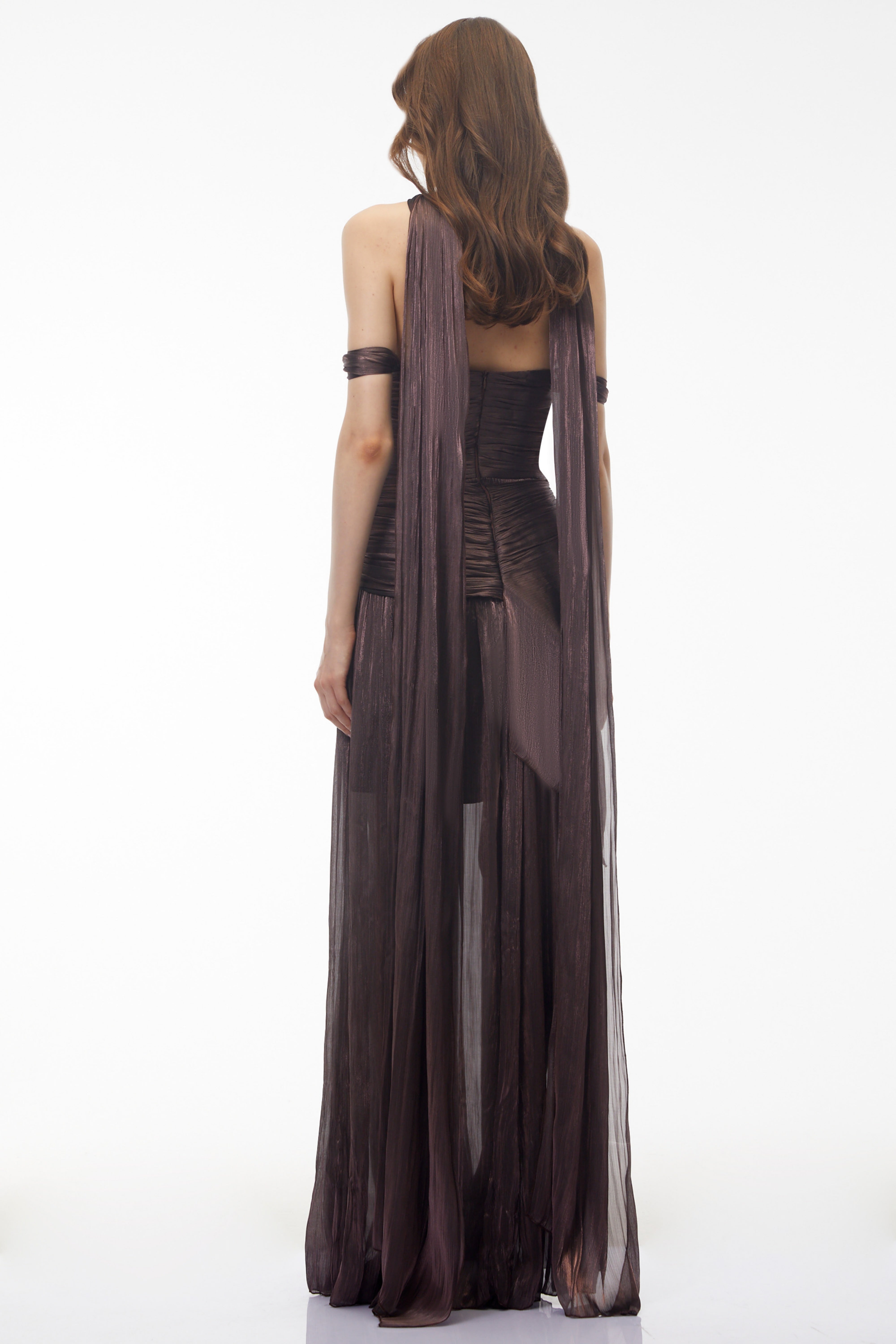 Metallic bronze maxi dress with an off-the-shoulder draped bodice, matching neck scarf, and high leg slit