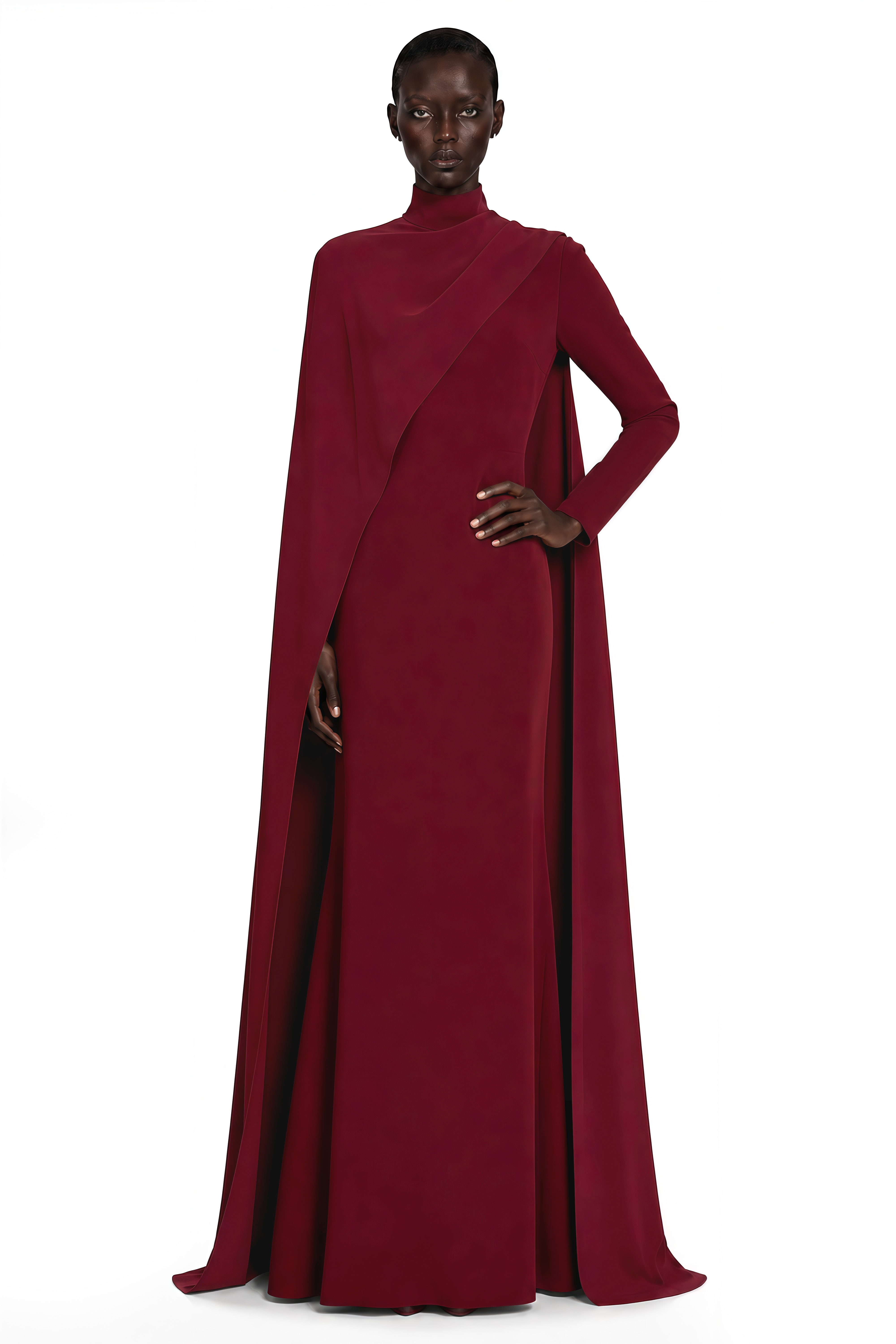Burgundy high-neck maxi dress with long sleeves and an asymmetric floor-length cape overlay