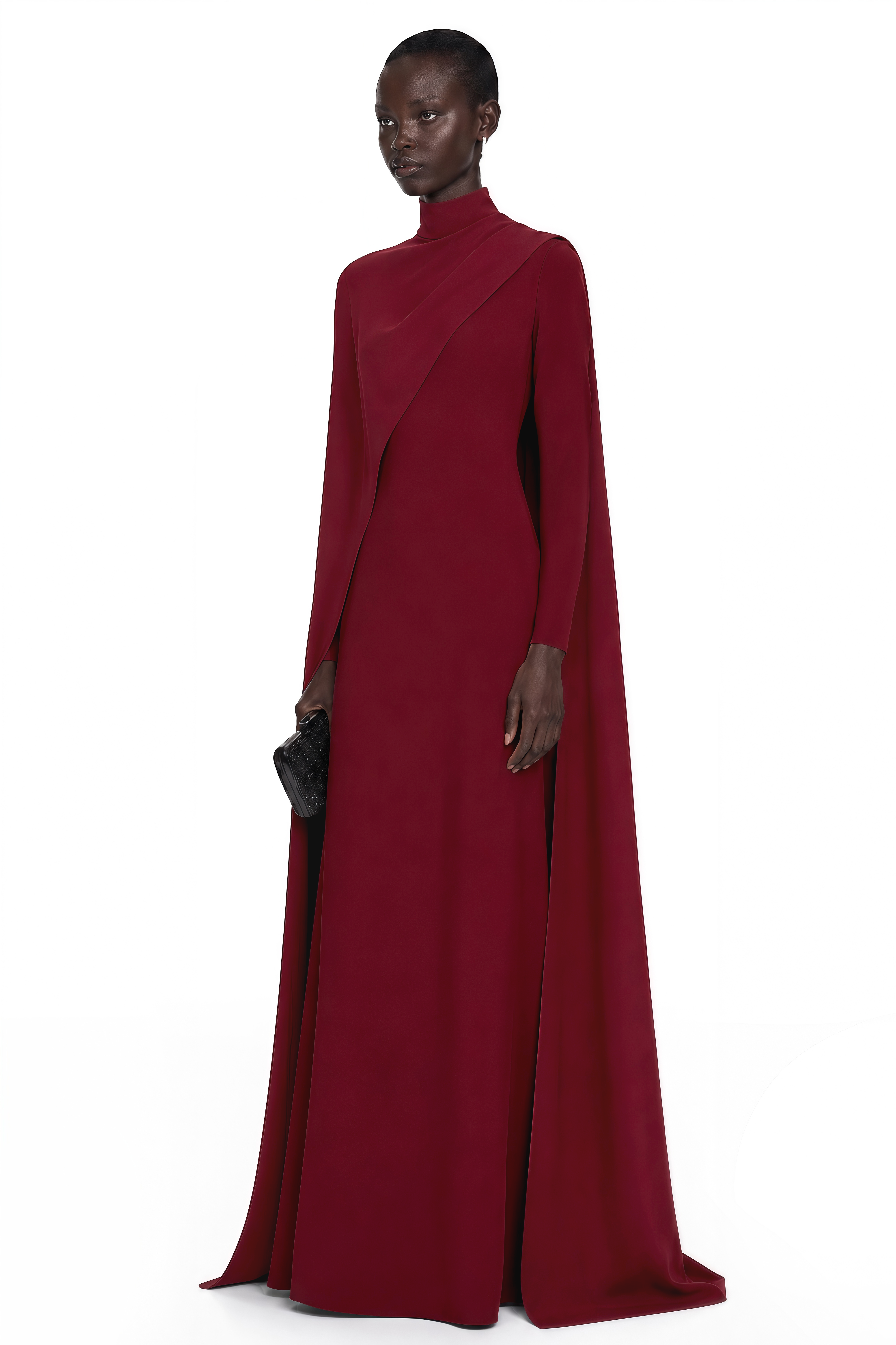 Burgundy high-neck maxi dress with long sleeves and an asymmetric floor-length cape overlay