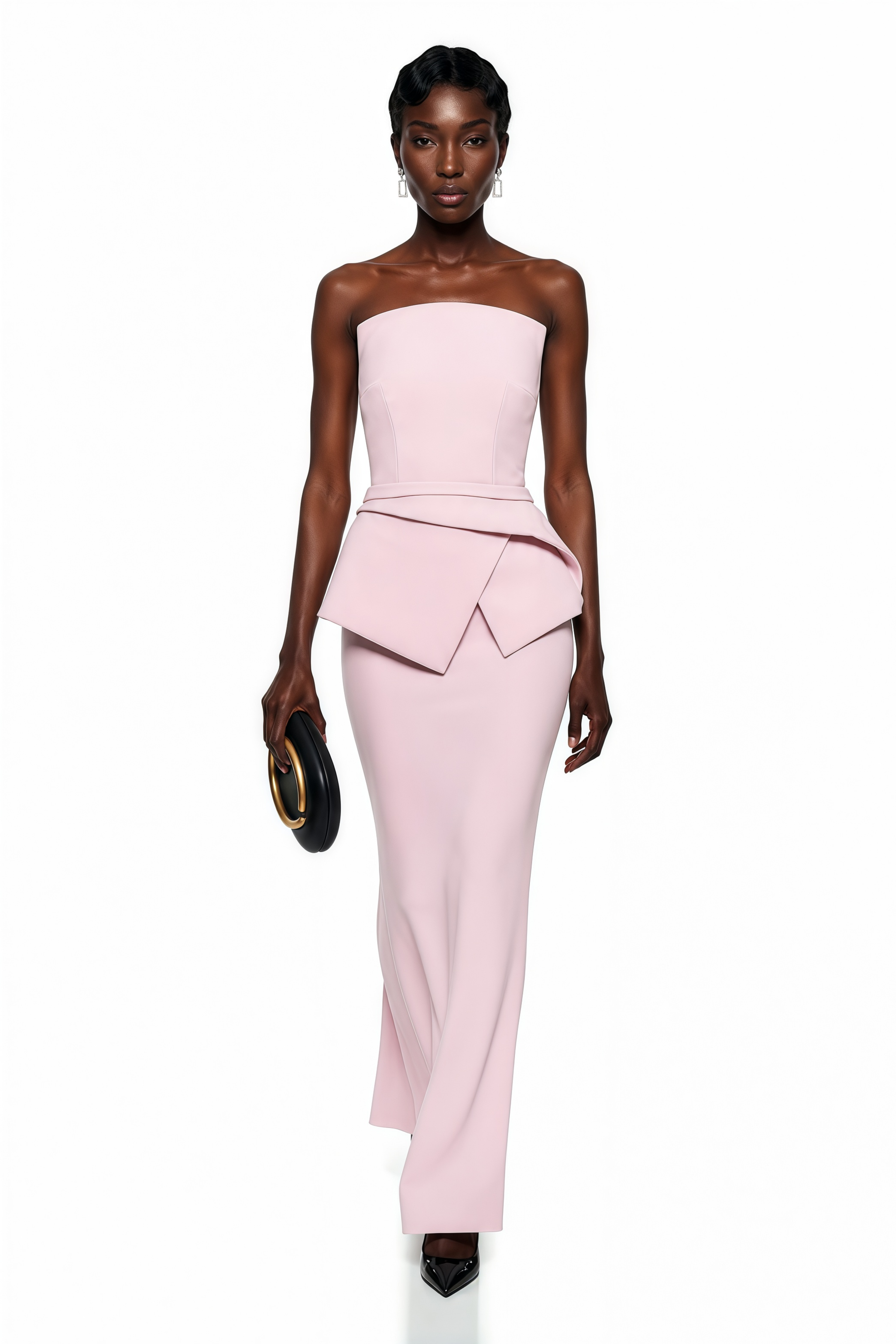 Light pink strapless maxi dress featuring a structured bodice and a geometric asymmetric peplum waist