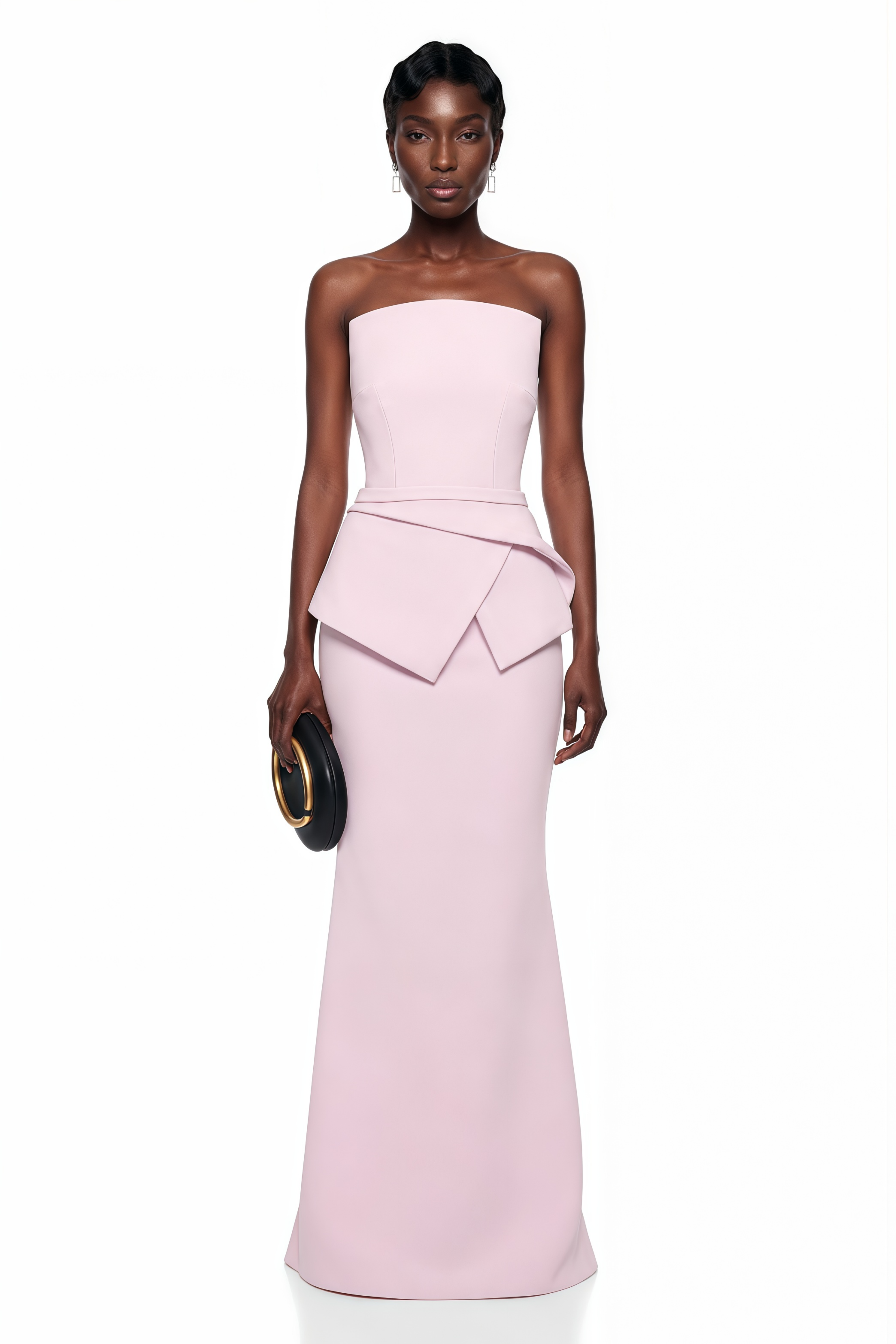 Light pink strapless maxi dress featuring a structured bodice and a geometric asymmetric peplum waist