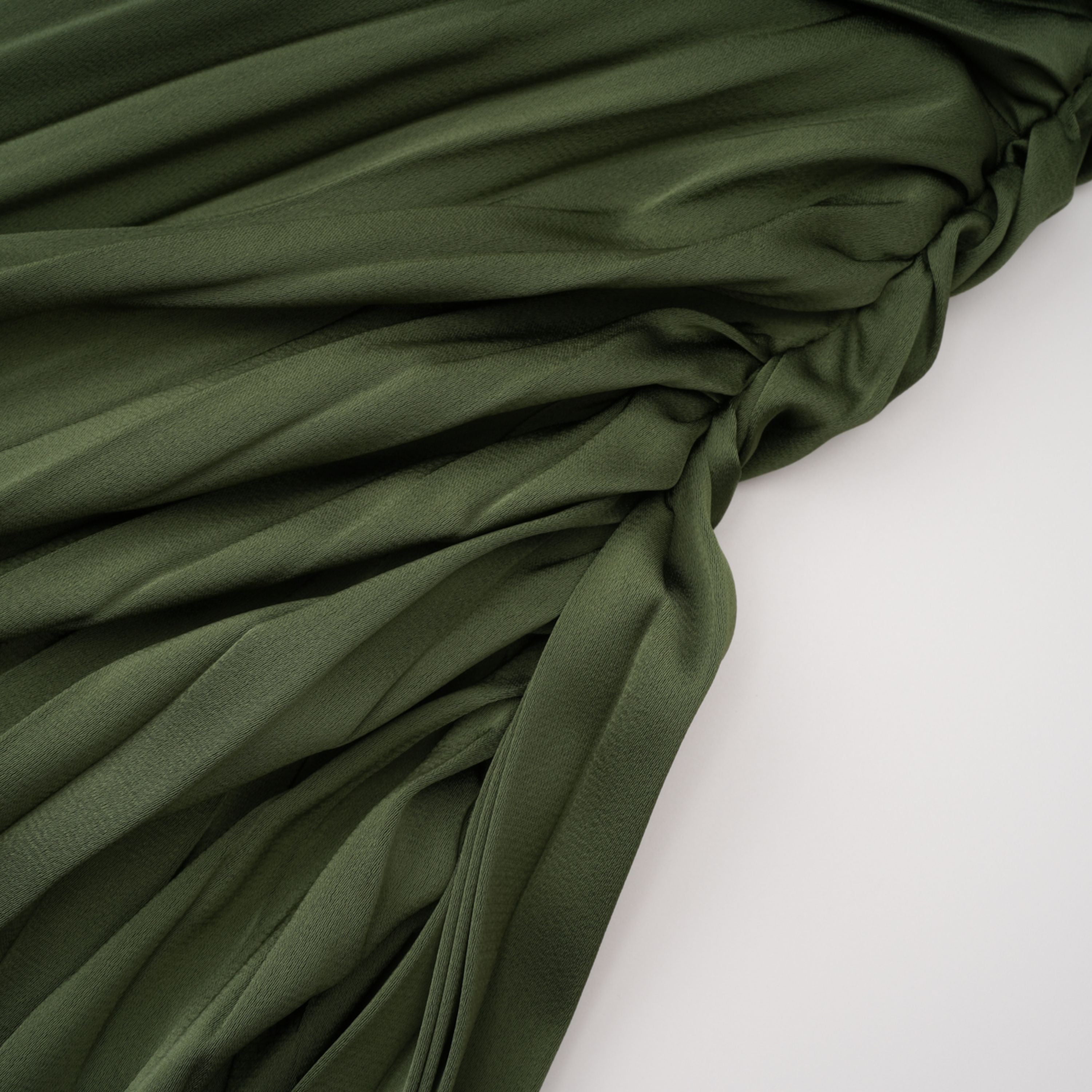 Olive green maxi dress with a pleated one-shoulder neckline and fully pleated draped skirt