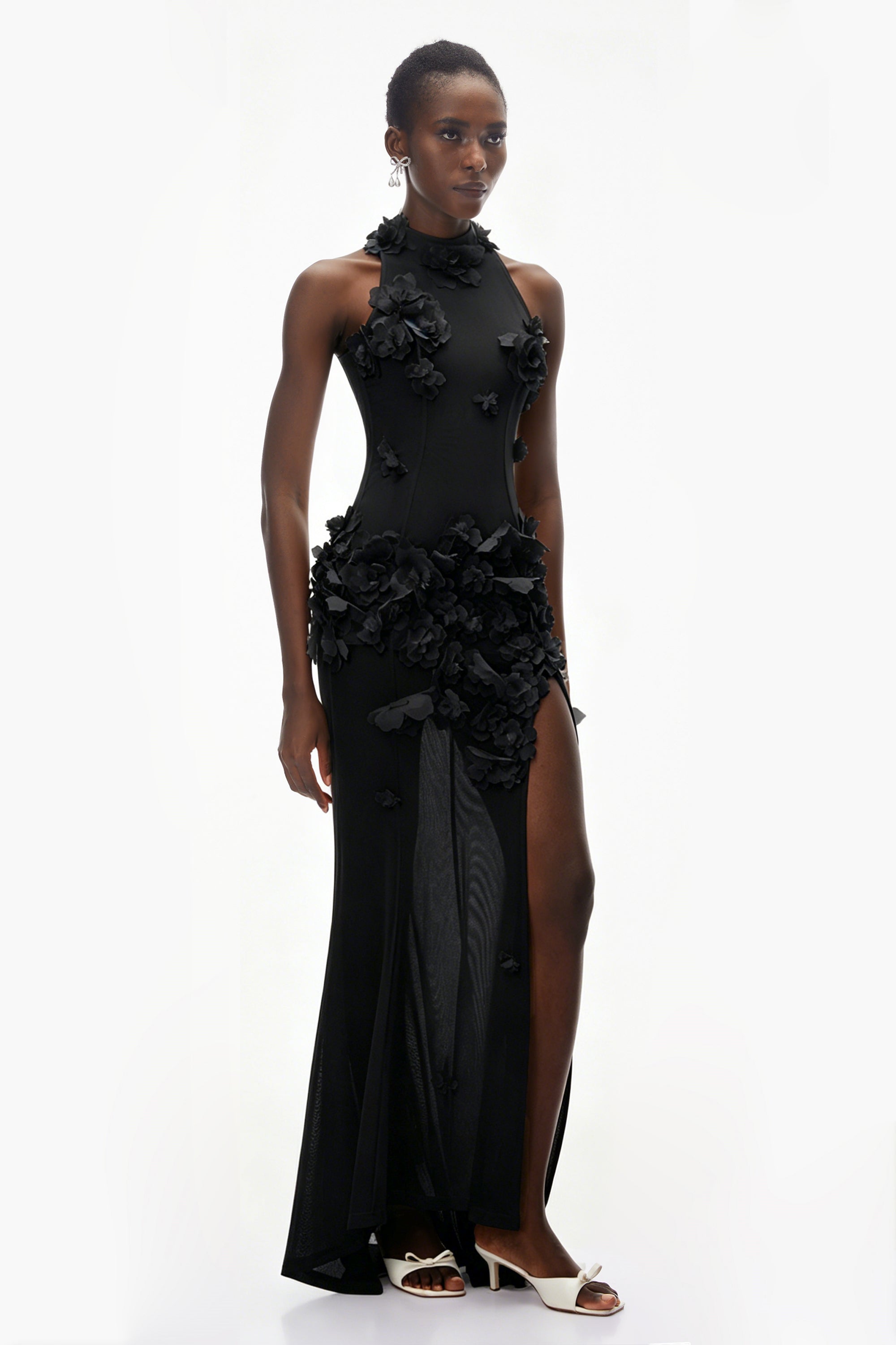 Black halter-neck maxi gown with 3D floral appliqué