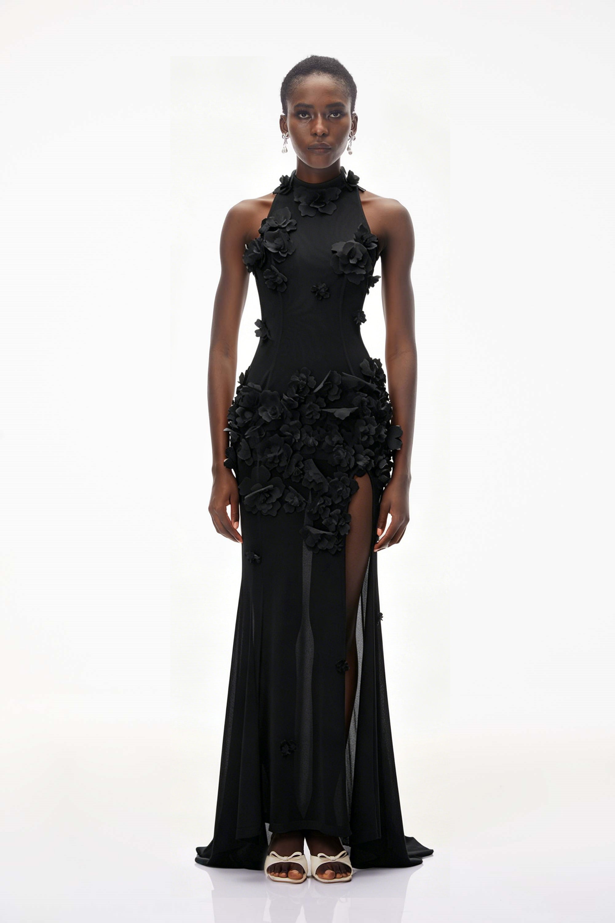 Black halter-neck maxi gown with 3D floral appliqué