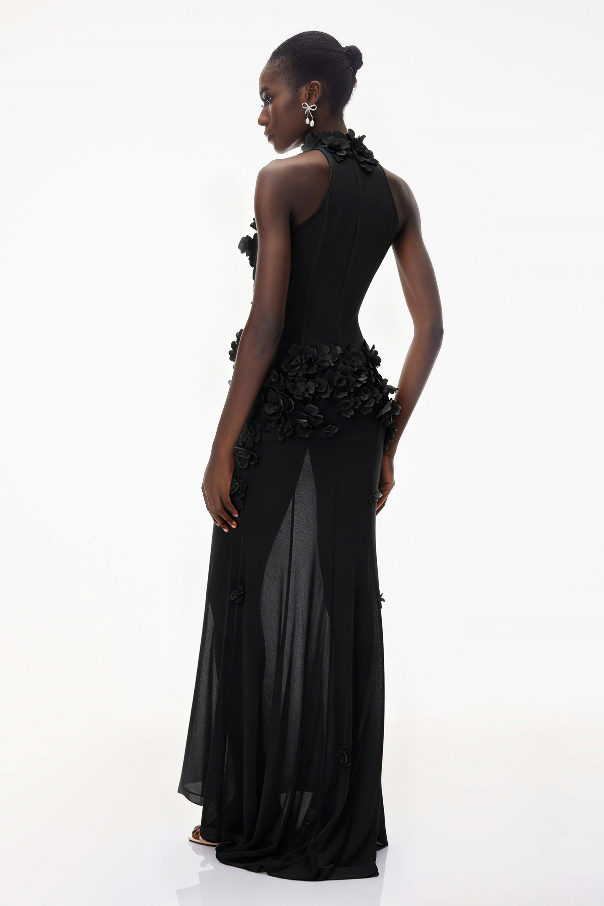 Black halter-neck maxi gown with 3D floral appliqué