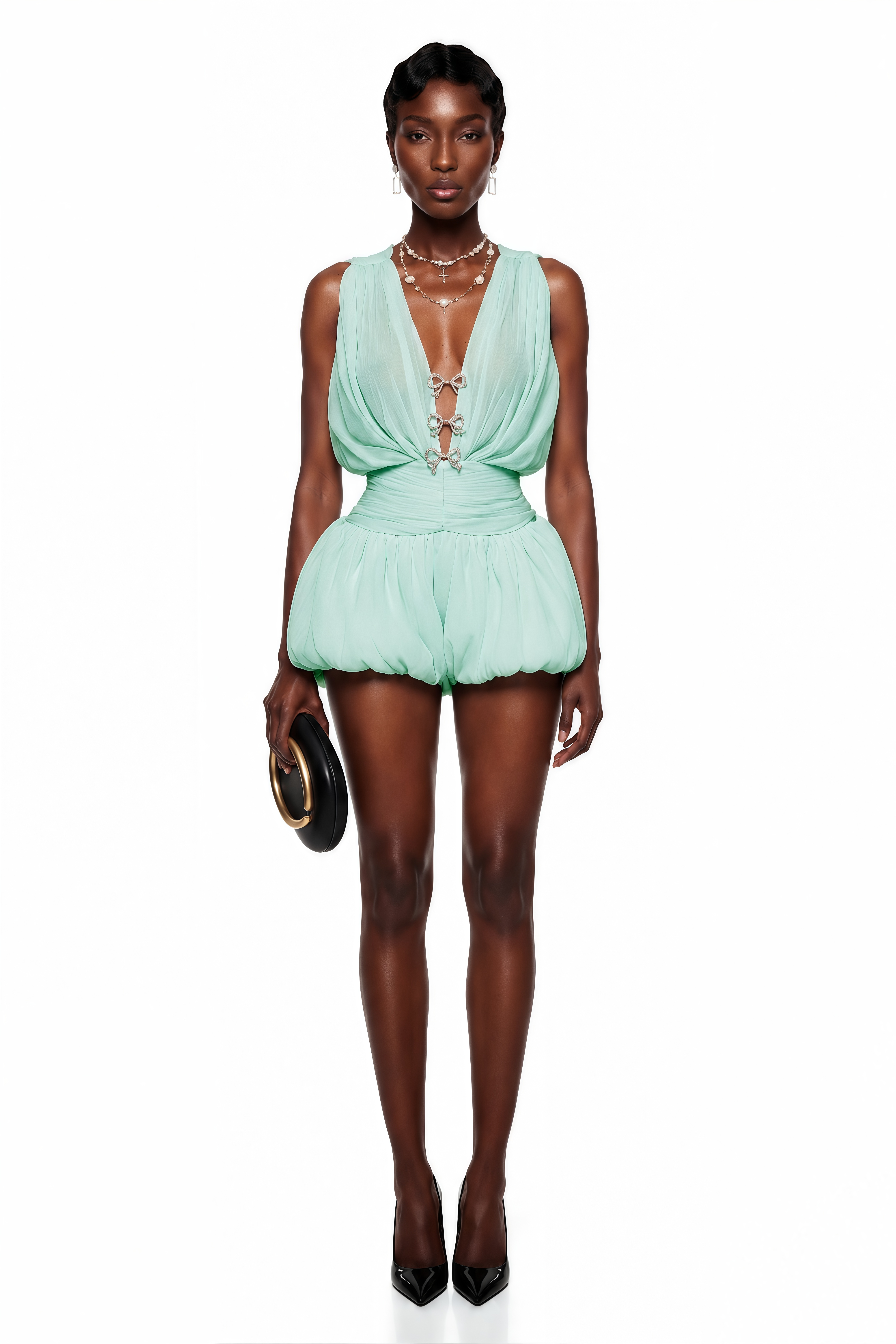 Mint green mini dress featuring a draped plunging V-neckline with bow closures, a ruched waistband, and a voluminous bubble skirt