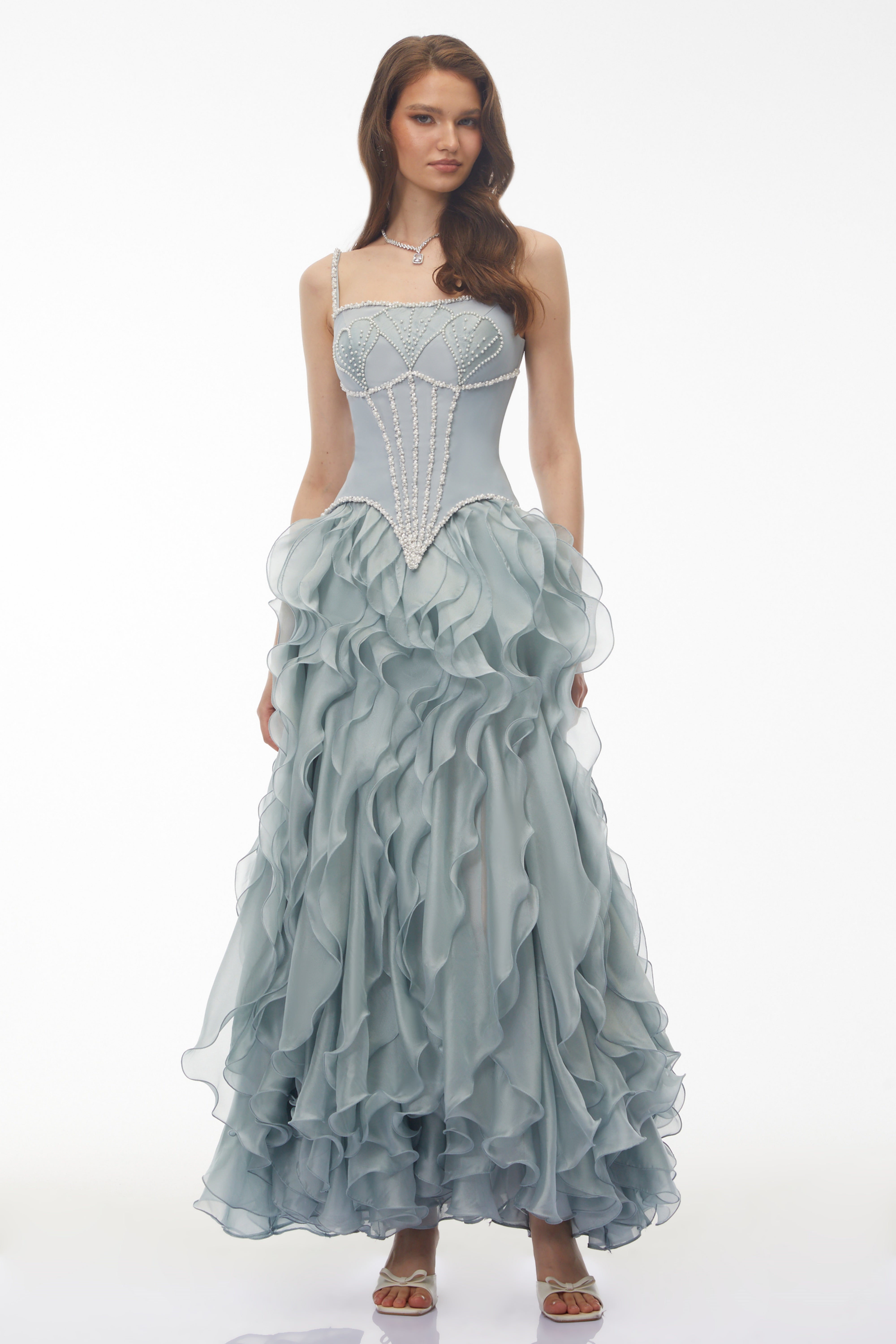 Dusty blue maxi dress with a pearl-embellished corset bodice and a tiered ruffled organza skirt