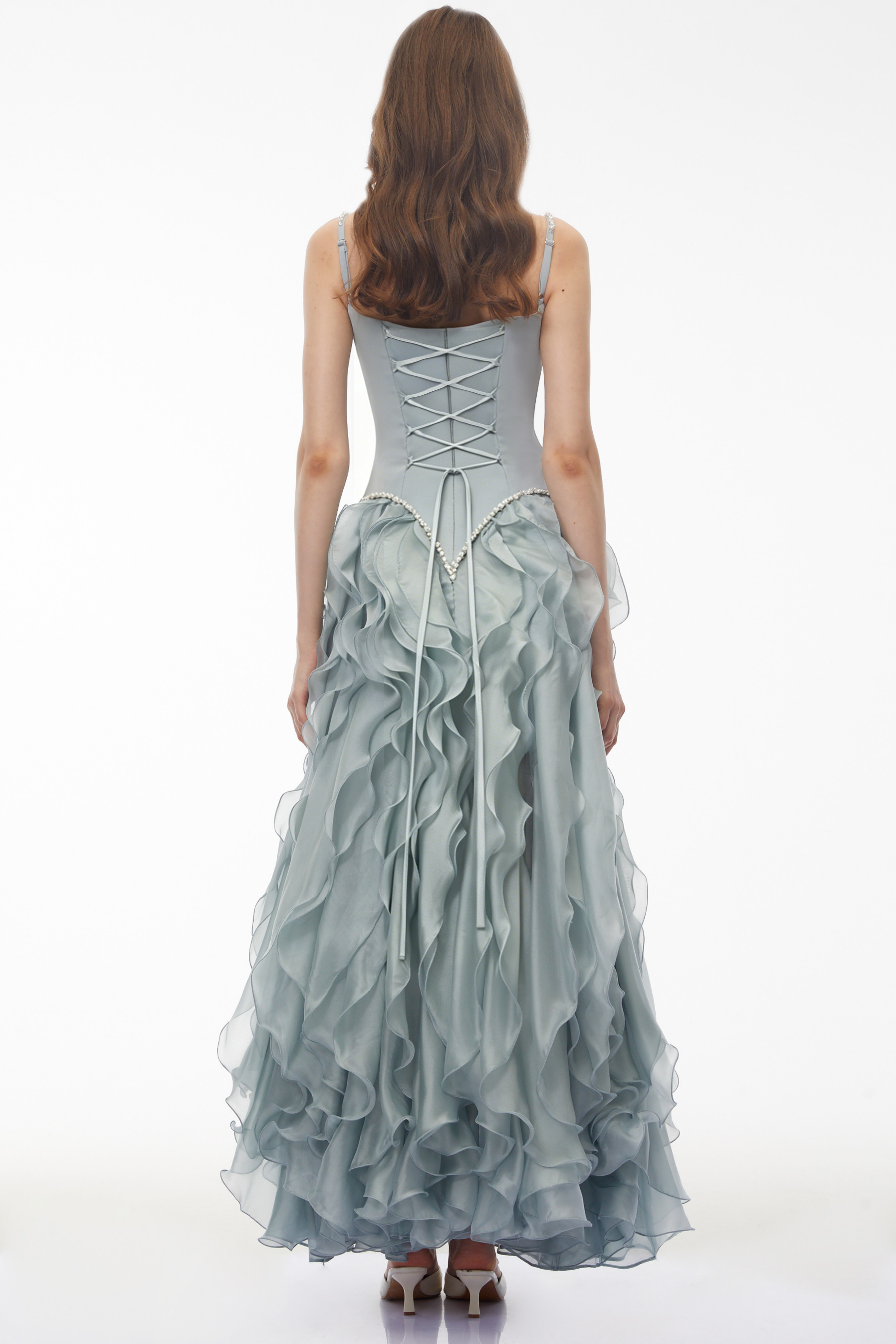 Dusty blue maxi dress with a pearl-embellished corset bodice and a tiered ruffled organza skirt