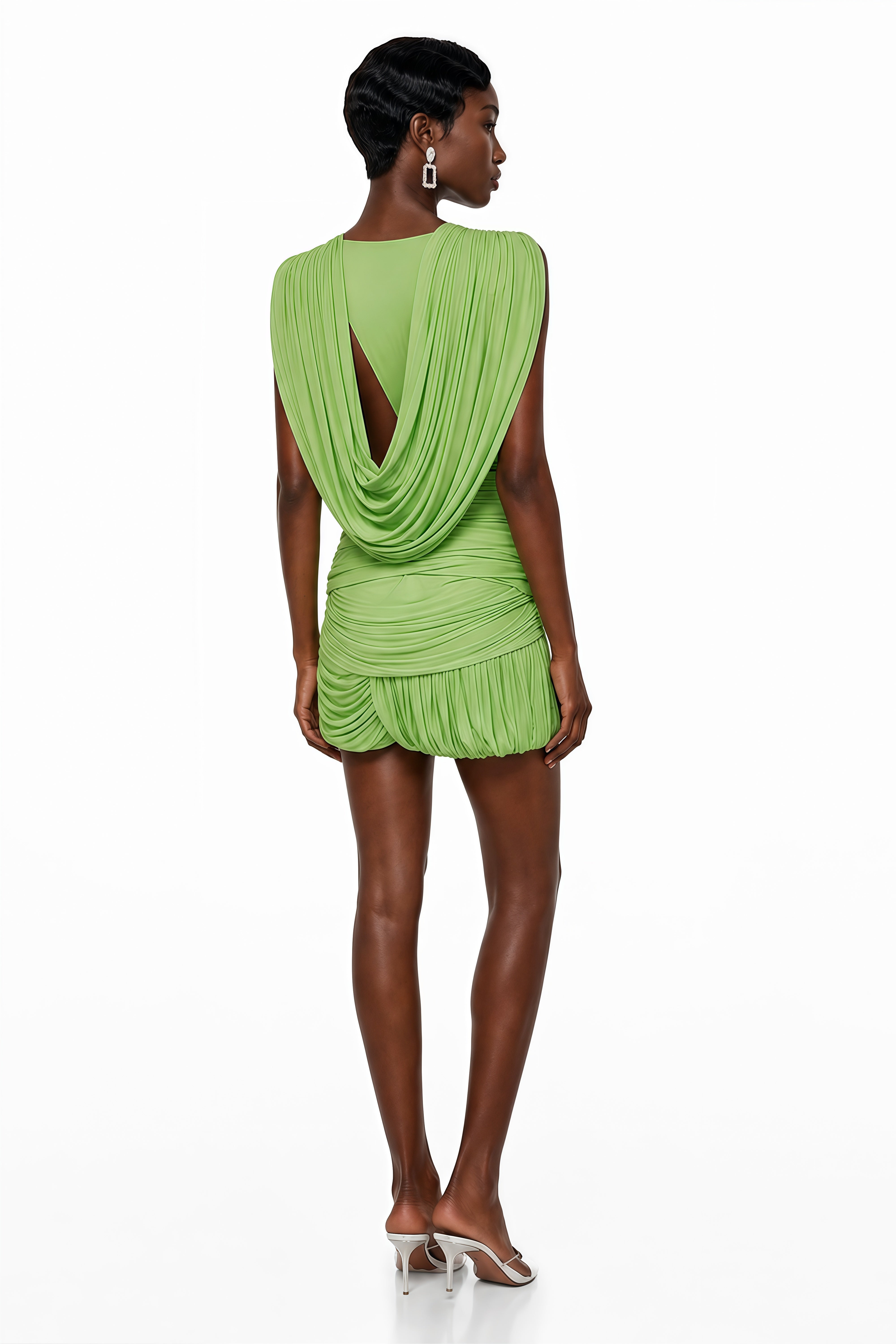 Champagne satin maxi dress with a draped cowl neckline, asymmetric straps, and a high leg slit