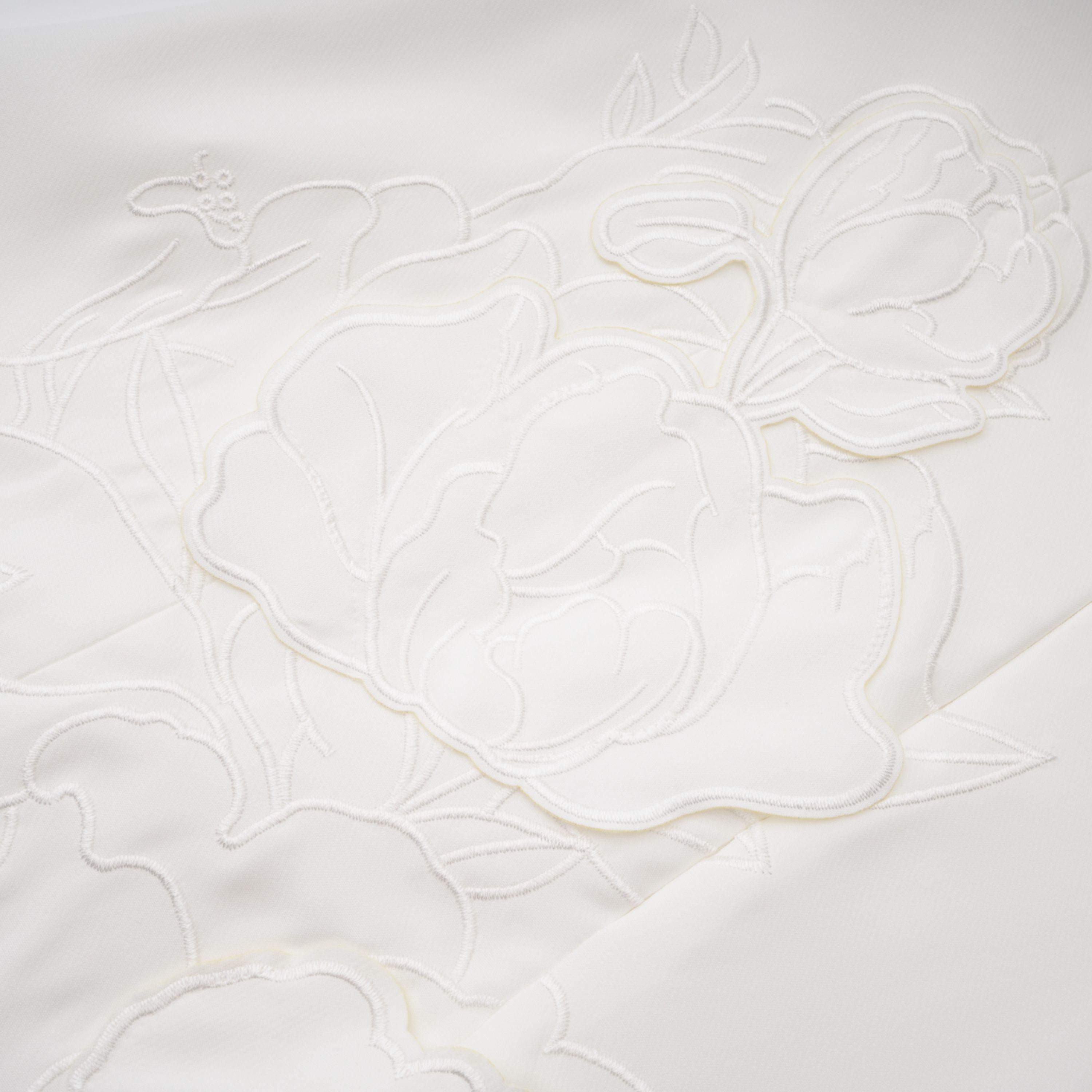 White strapless mini dress with 3D floral appliqués