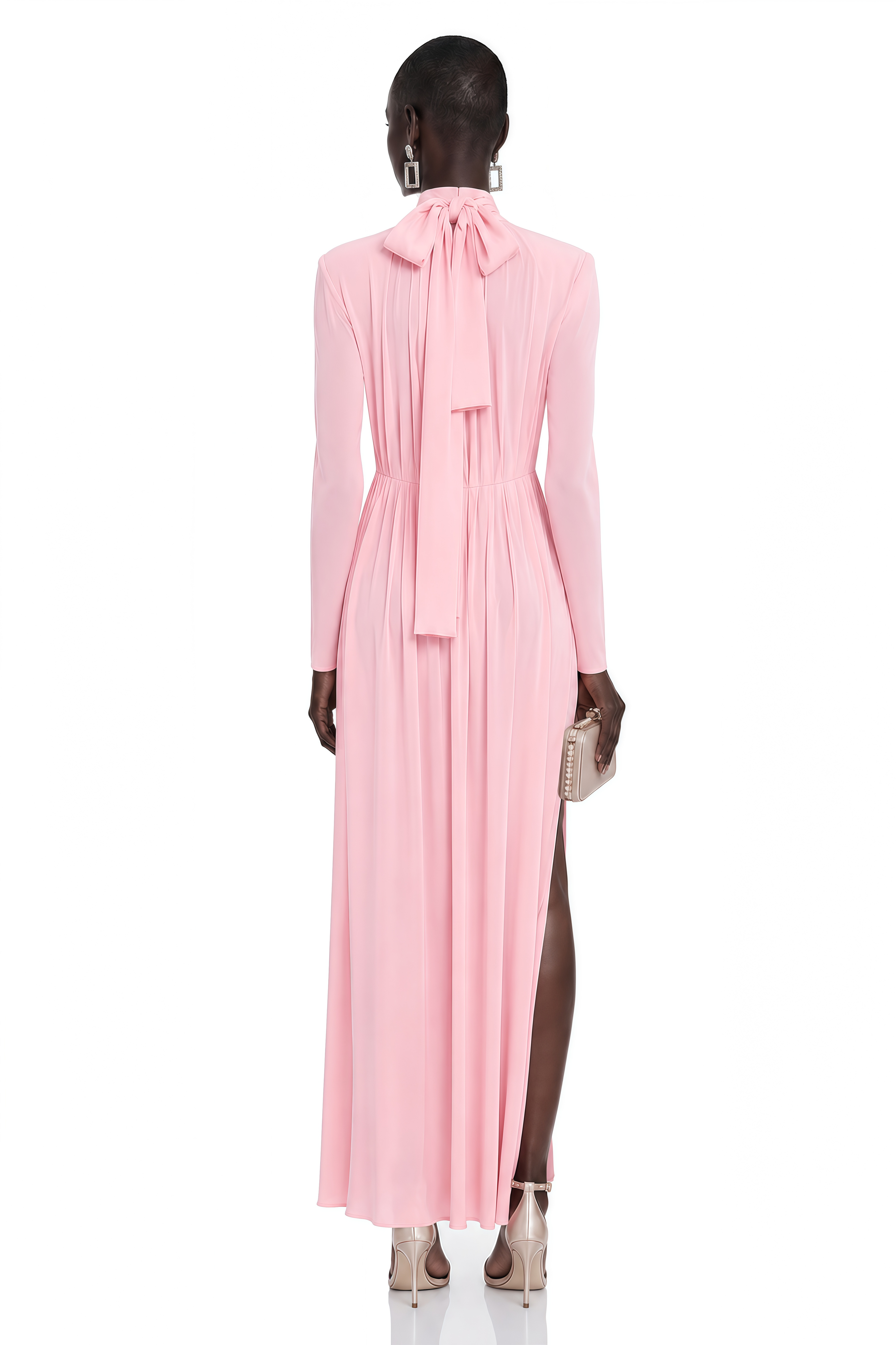Pink high-neck pleated gown with neck tie and floral rosettes