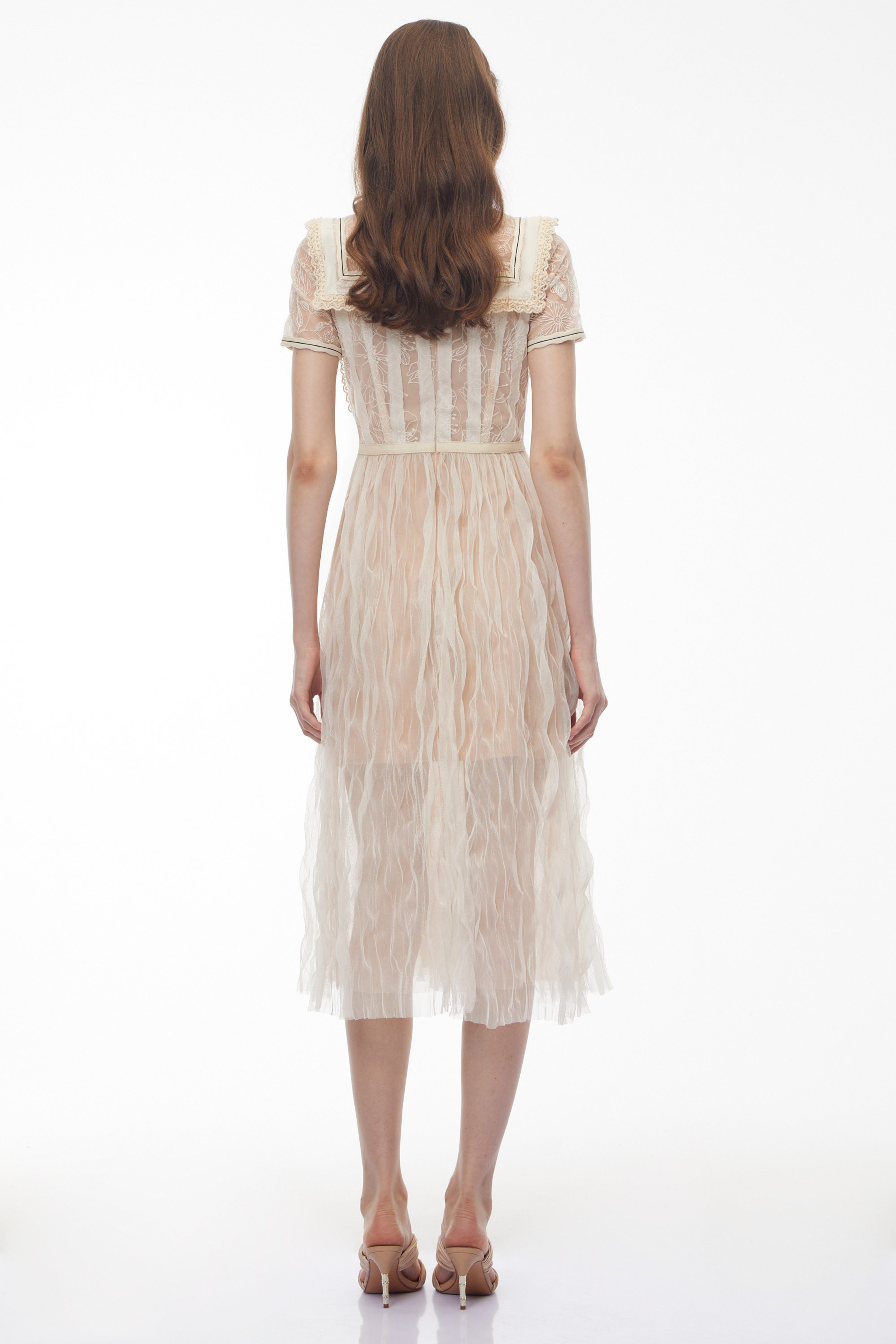 Beige lace midi dress with floral embroidery and bib detail
