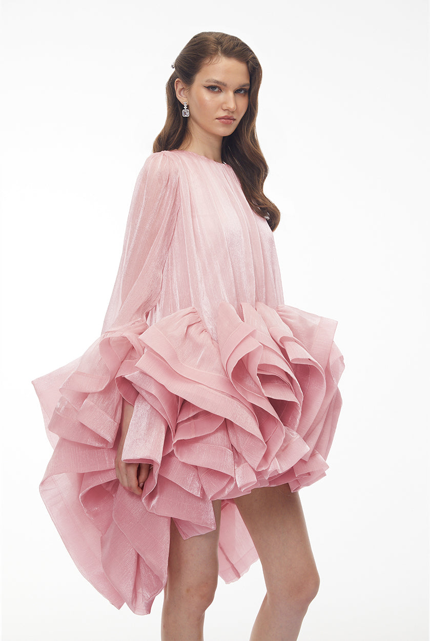 Pink organza high-low mini dress featuring a pleated bodice and a dramatic multi-layered ruffled skirt