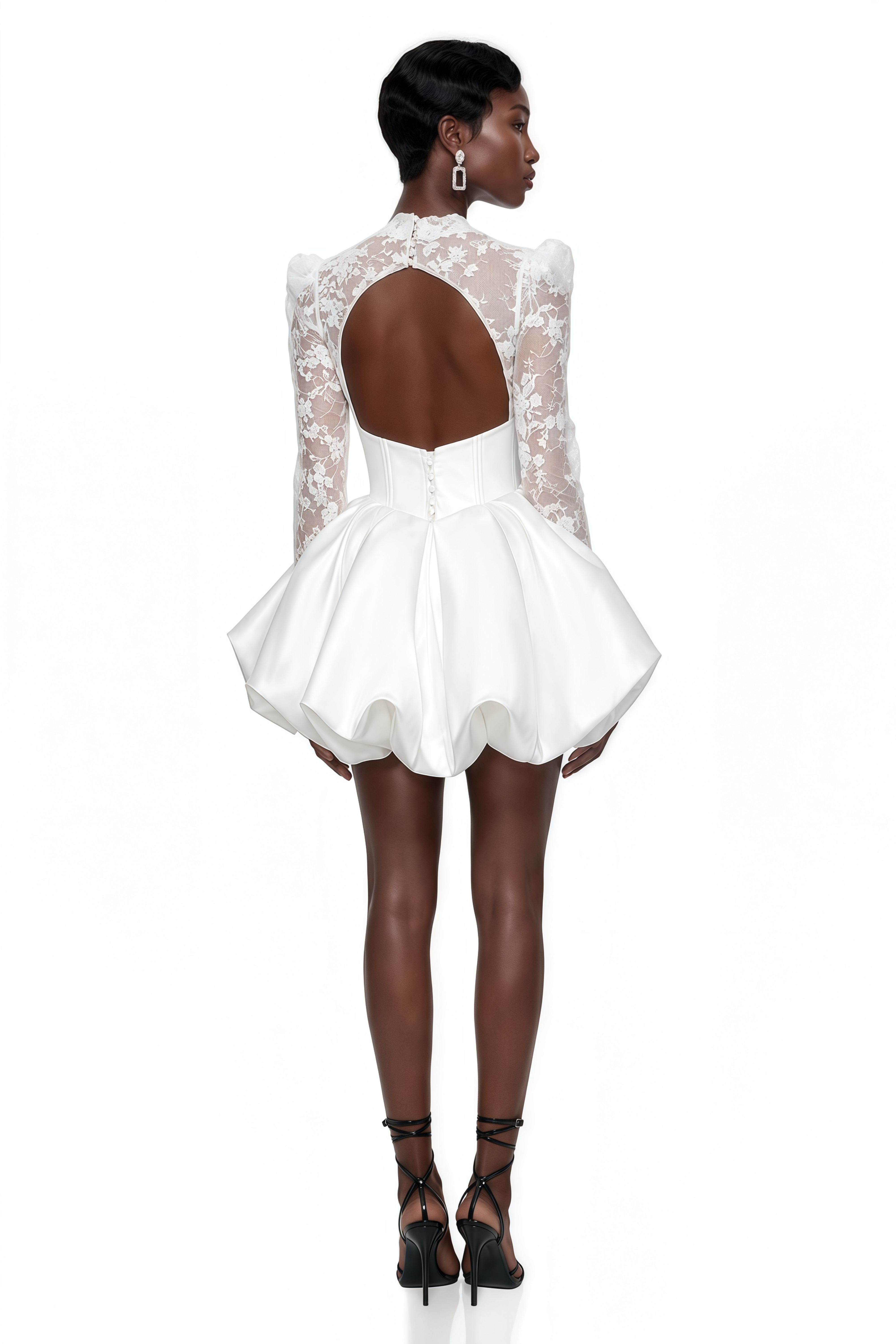 White mini dress featuring a sheer floral lace mock-neck bodice and a structured satin bubble skirt
