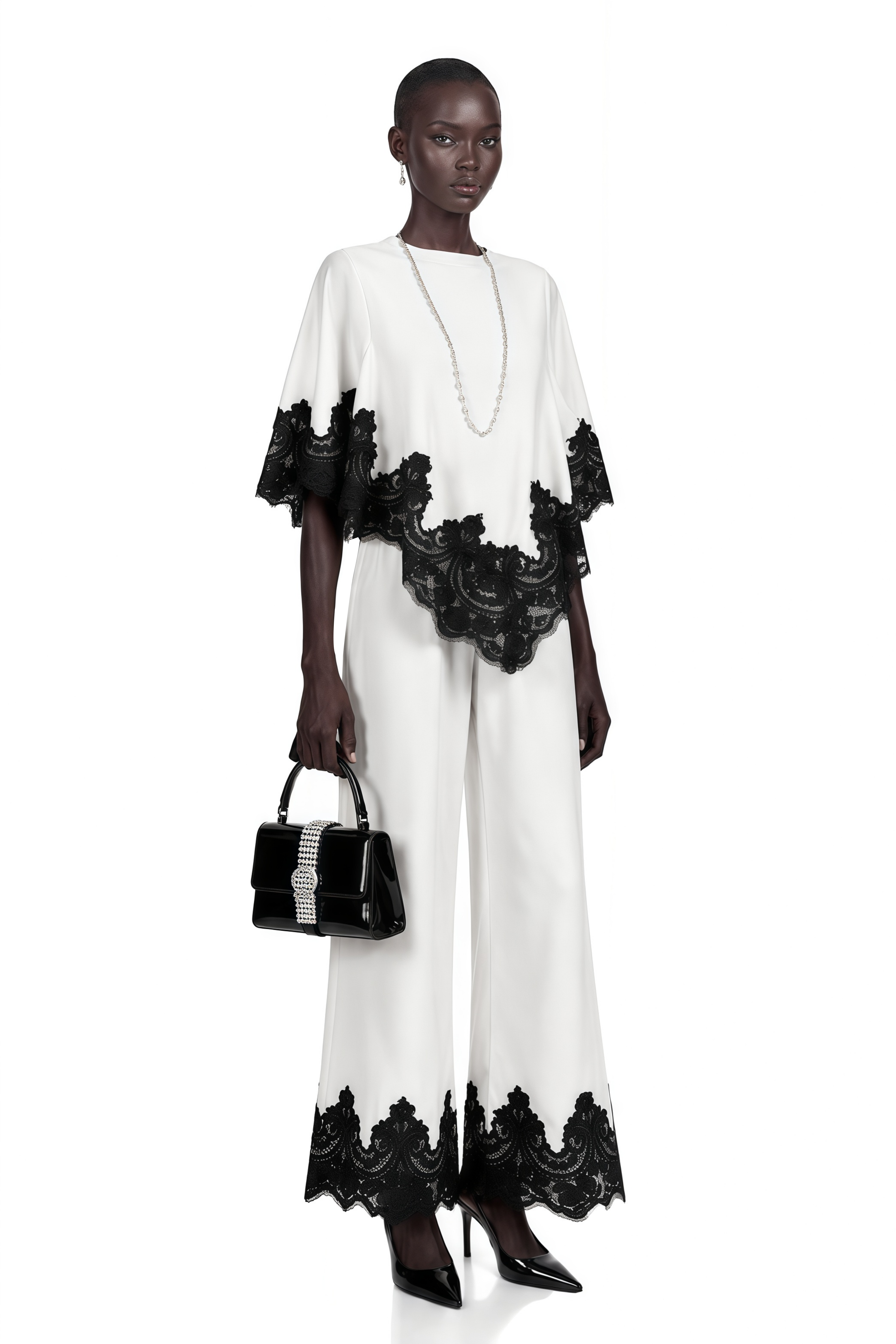 White high-neck cape top and wide-leg trousers set with black lace trim