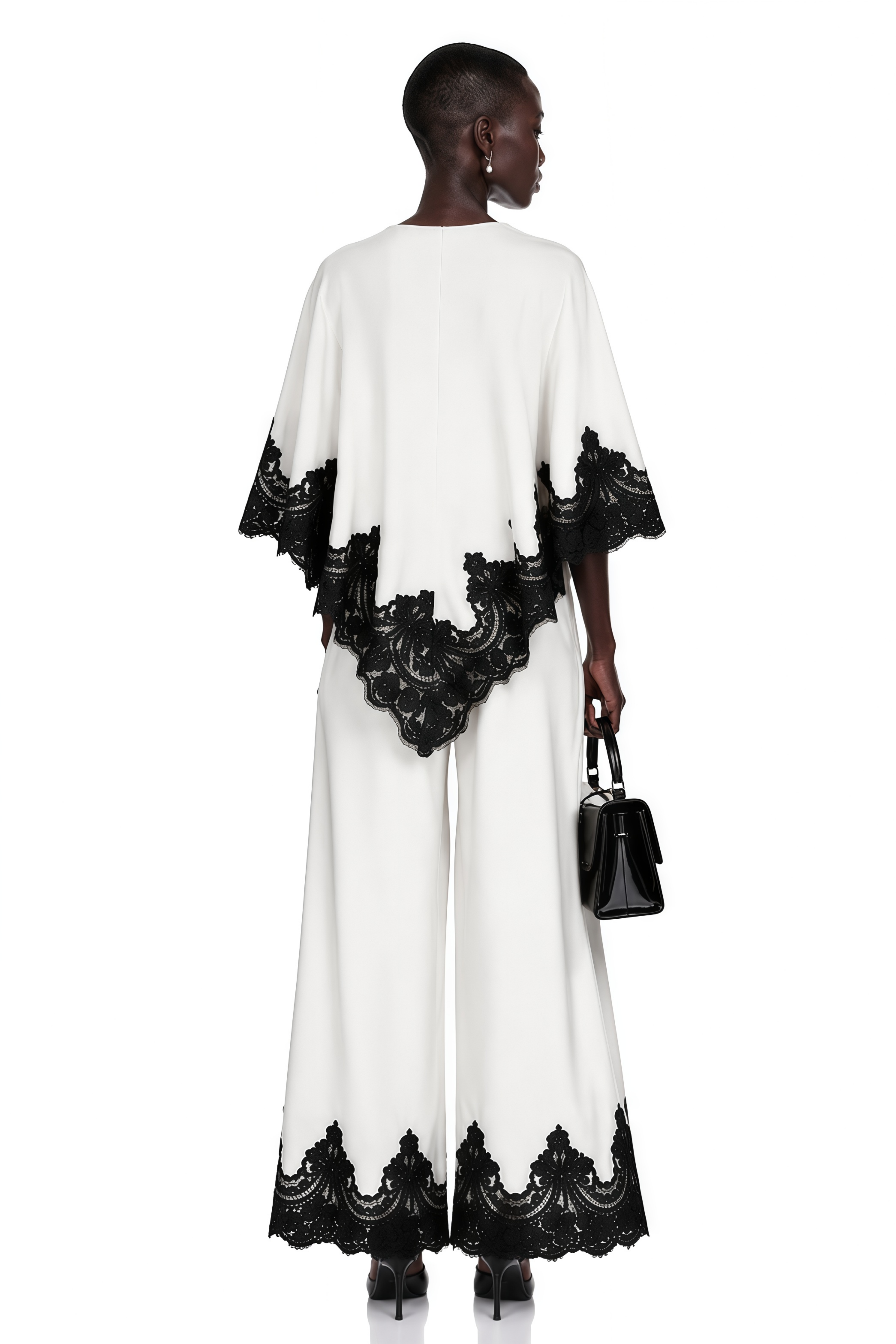 White high-neck cape top and wide-leg trousers set with black lace trim