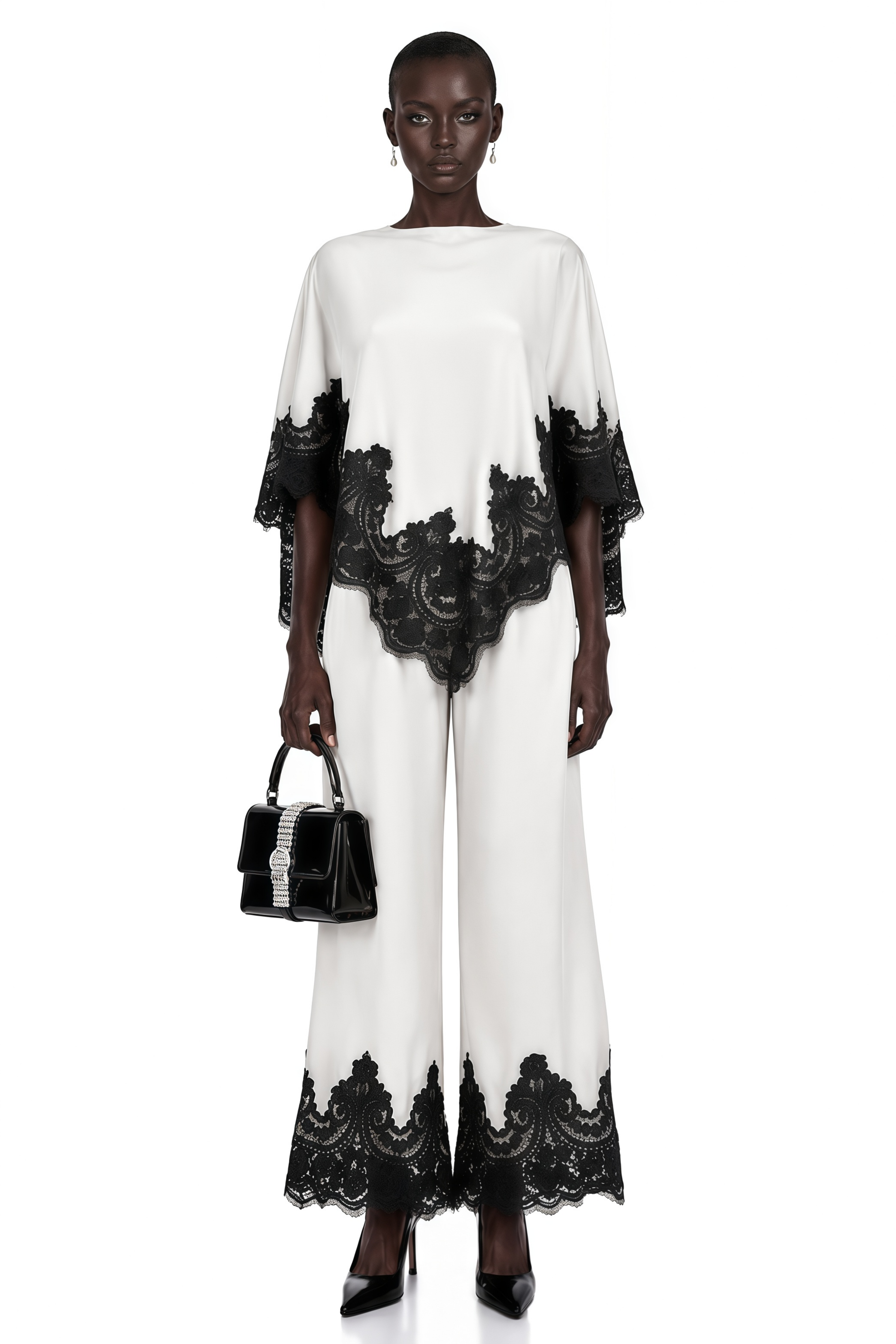 White high-neck cape top and wide-leg trousers set with black lace trim