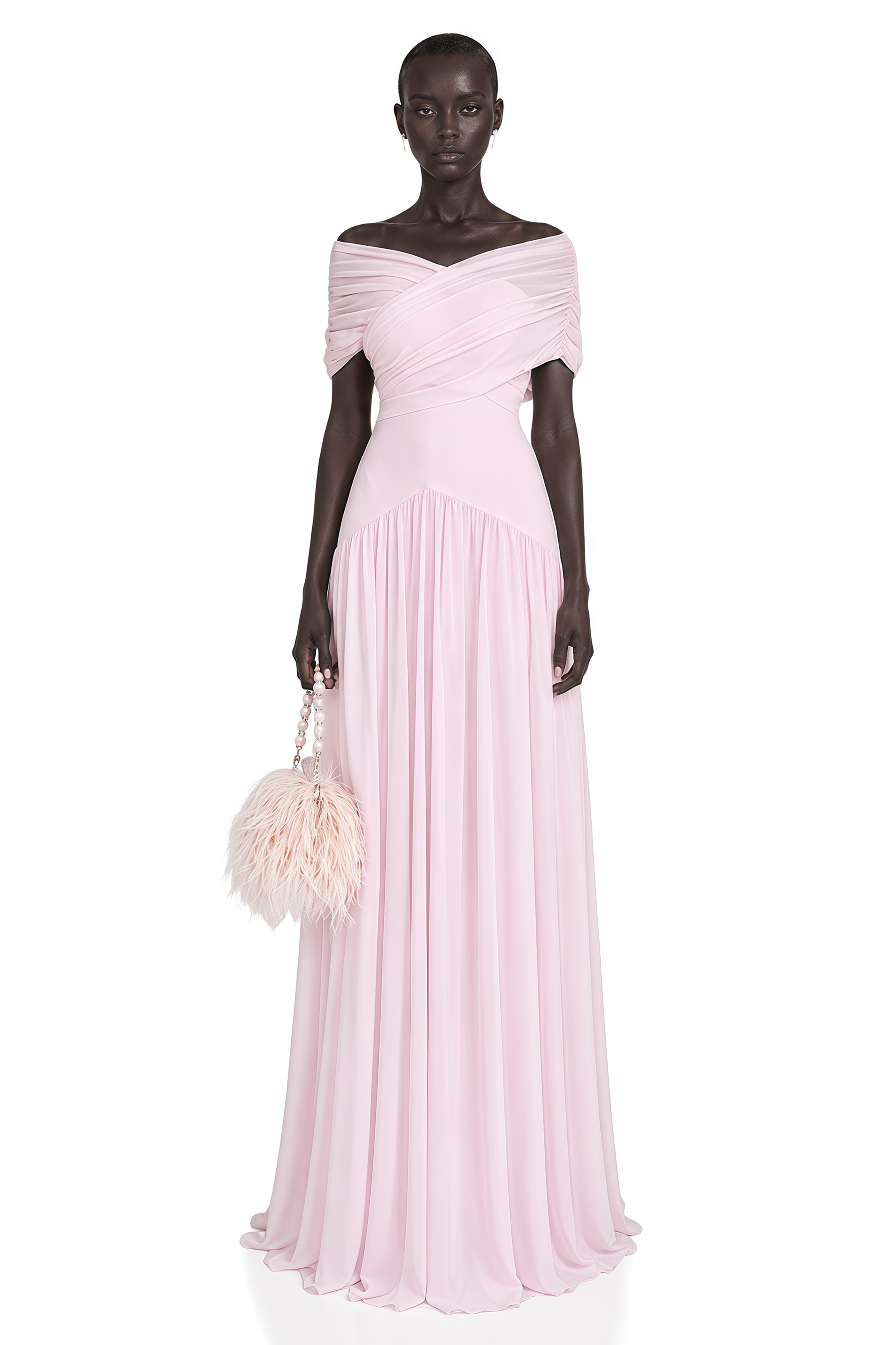 Light pink off-the-shoulder maxi dress with a criss-cross bodice and flowing skirt