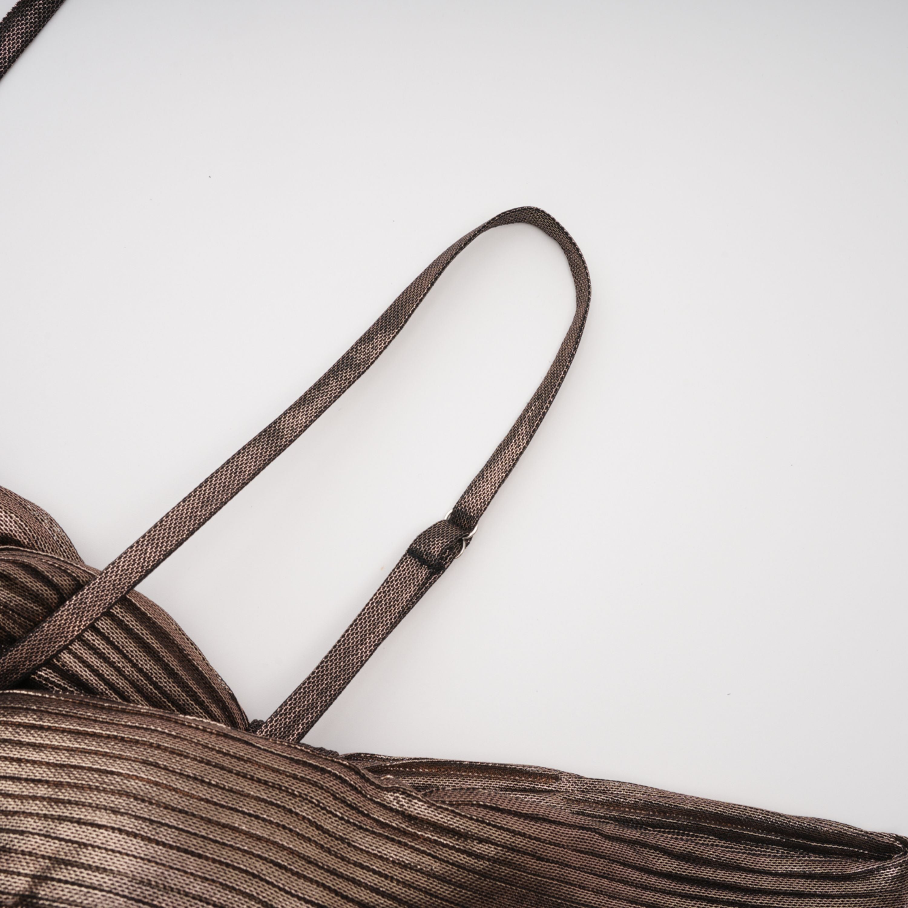 Bronze metallic plissé maxi dress with a plunging V-neckline and off-the-shoulder straps