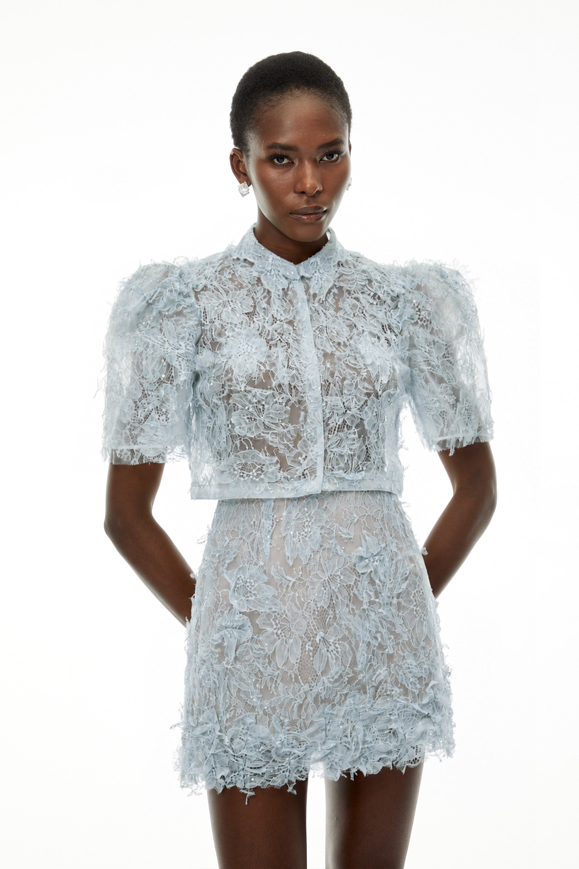 Light blue short-sleeve lace mini dress with a structured, collared overlay