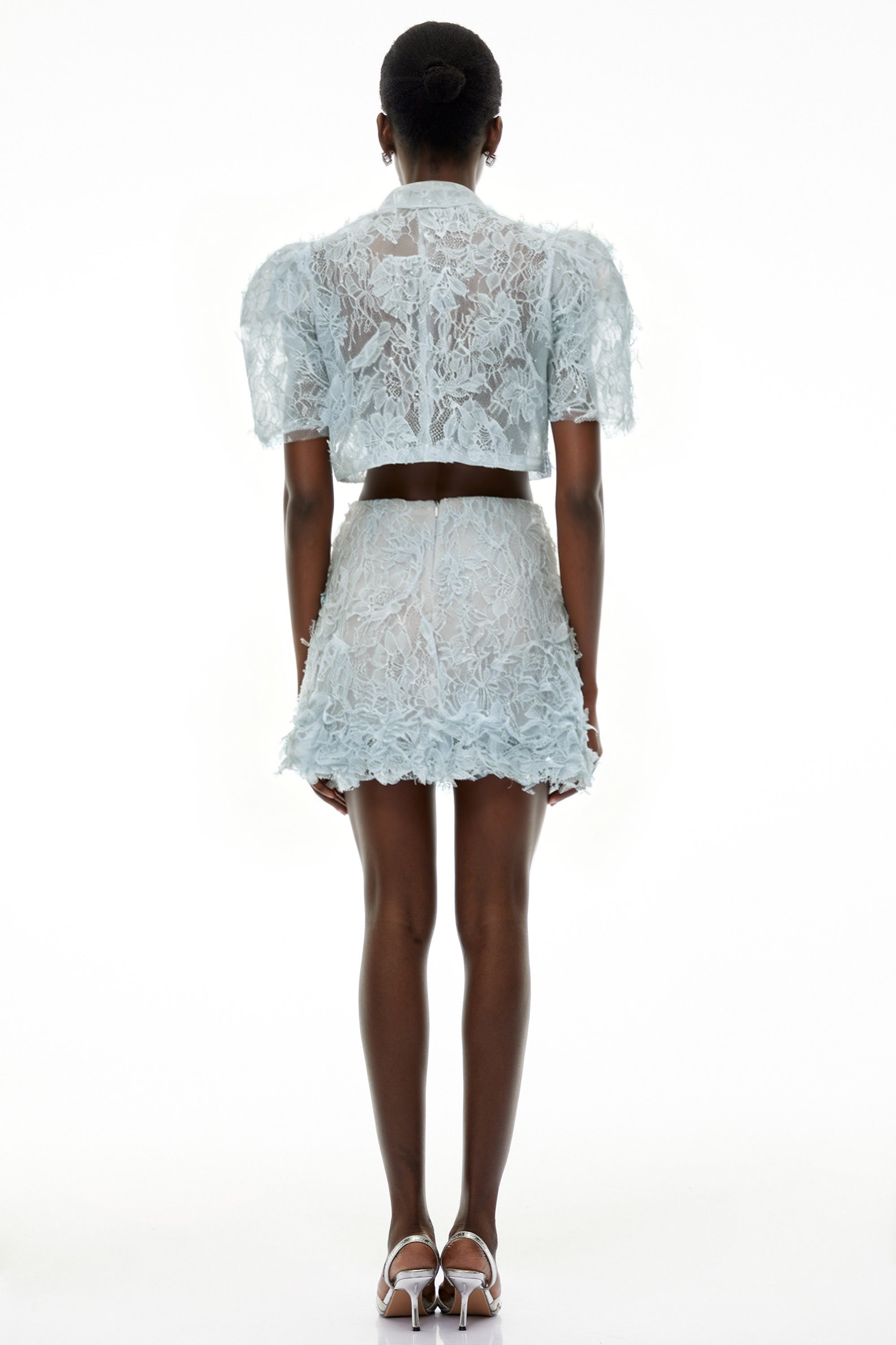Light blue short-sleeve lace mini dress with a structured, collared overlay