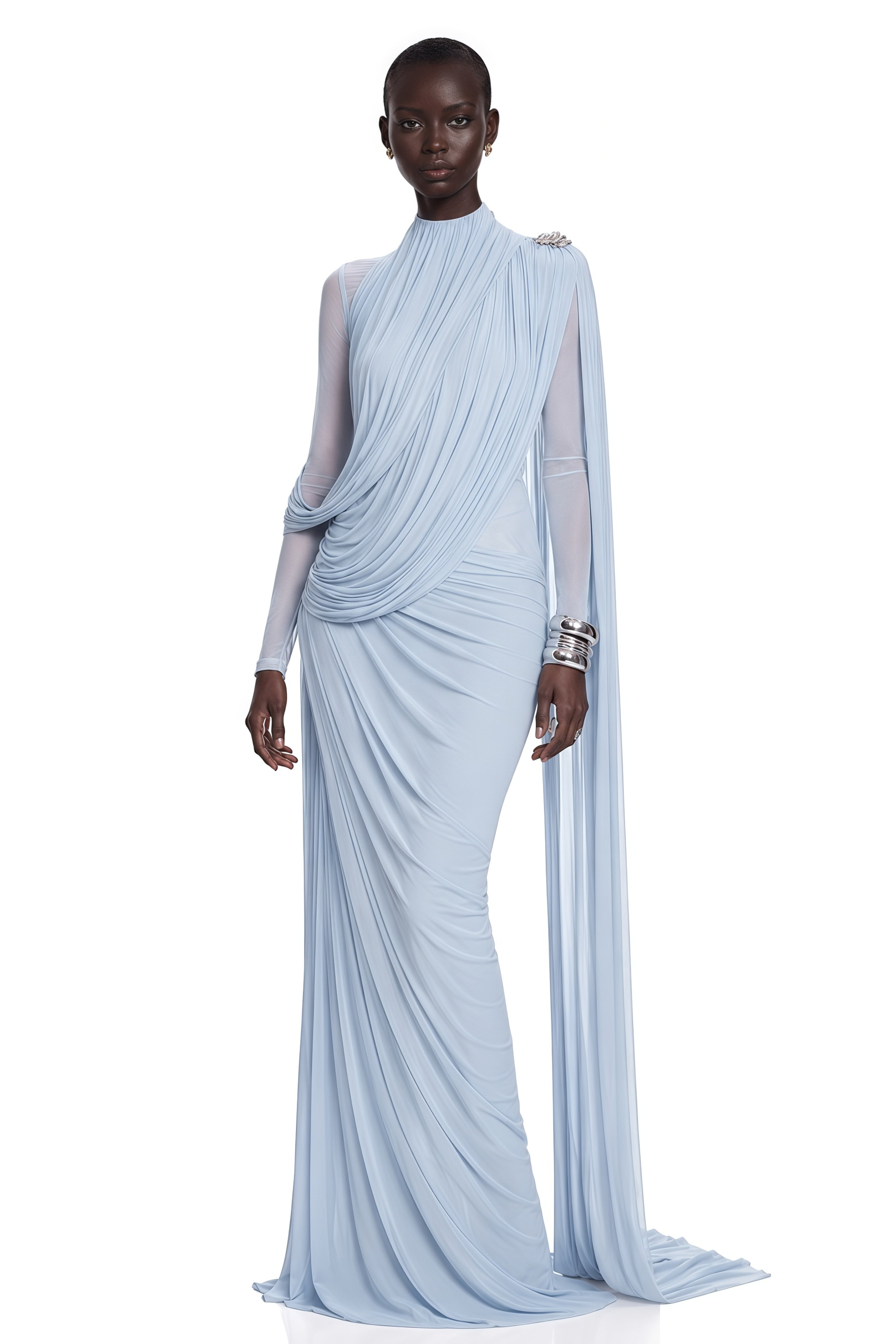 Light blue high-neck draped maxi dress with sheer sleeves and a shoulder cape overlay