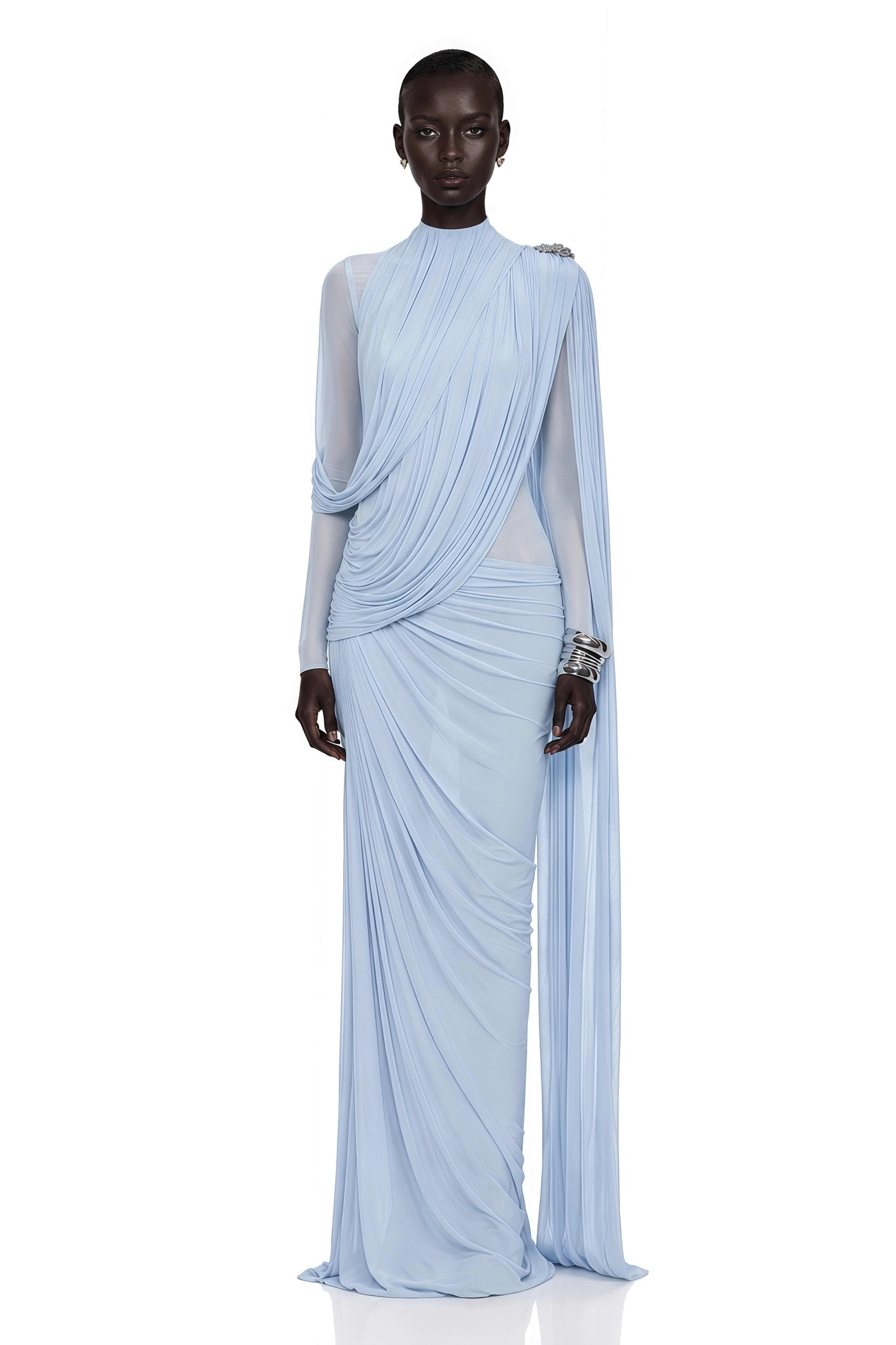 Light blue high-neck draped maxi dress with sheer sleeves and a shoulder cape overlay