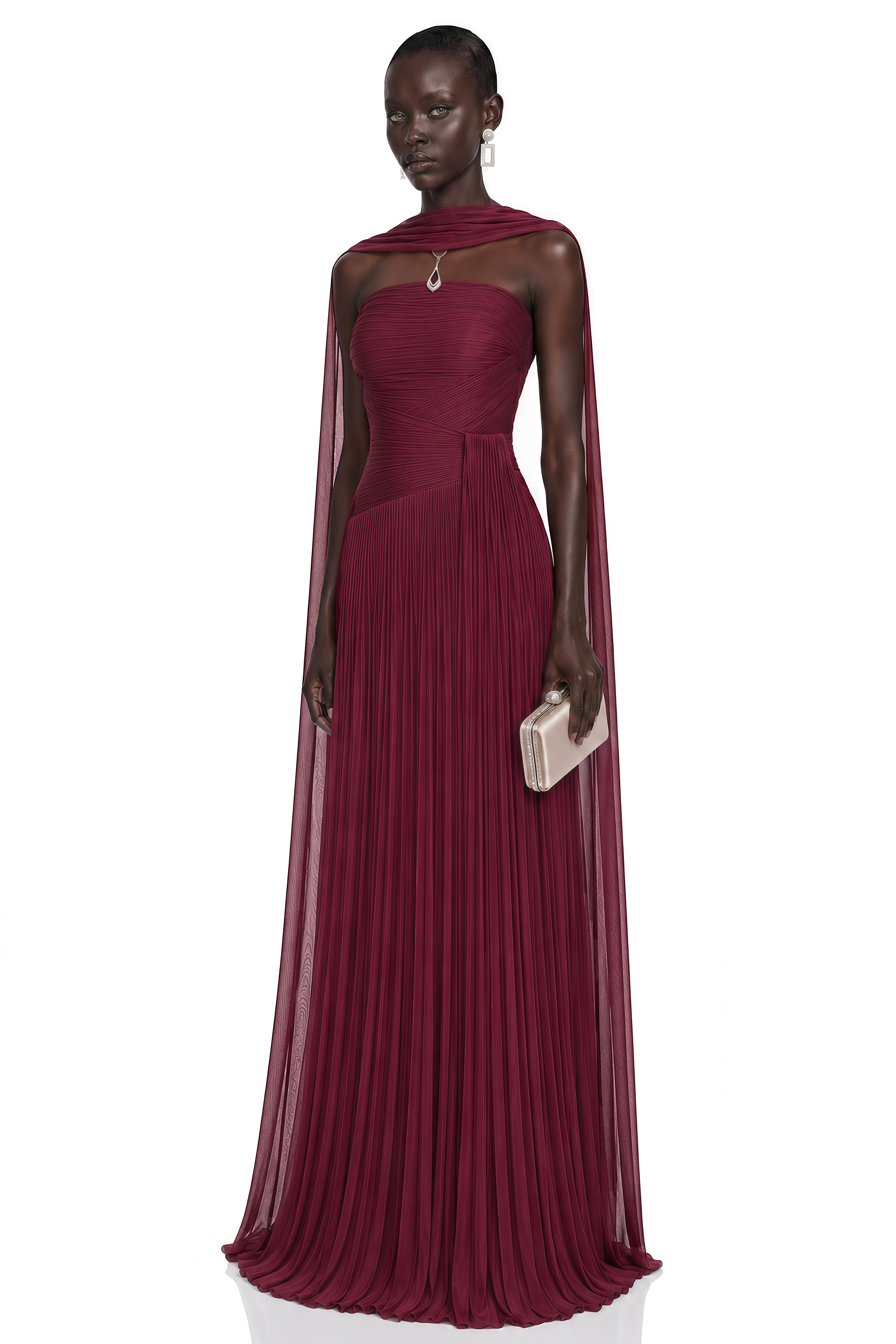 Burgundy strapless pleated maxi dress with a matching cape overlay