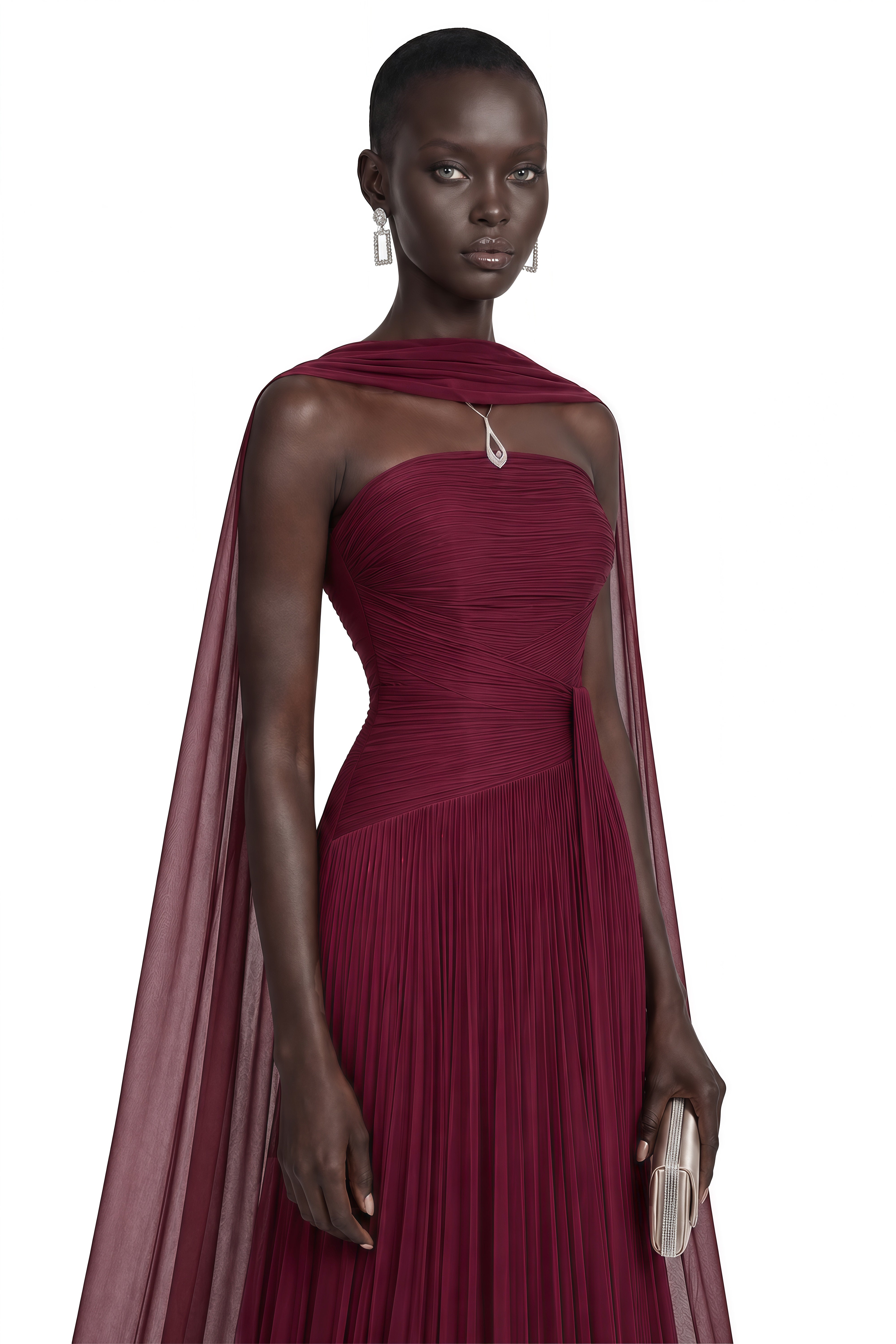 Burgundy strapless pleated maxi dress with a matching cape overlay