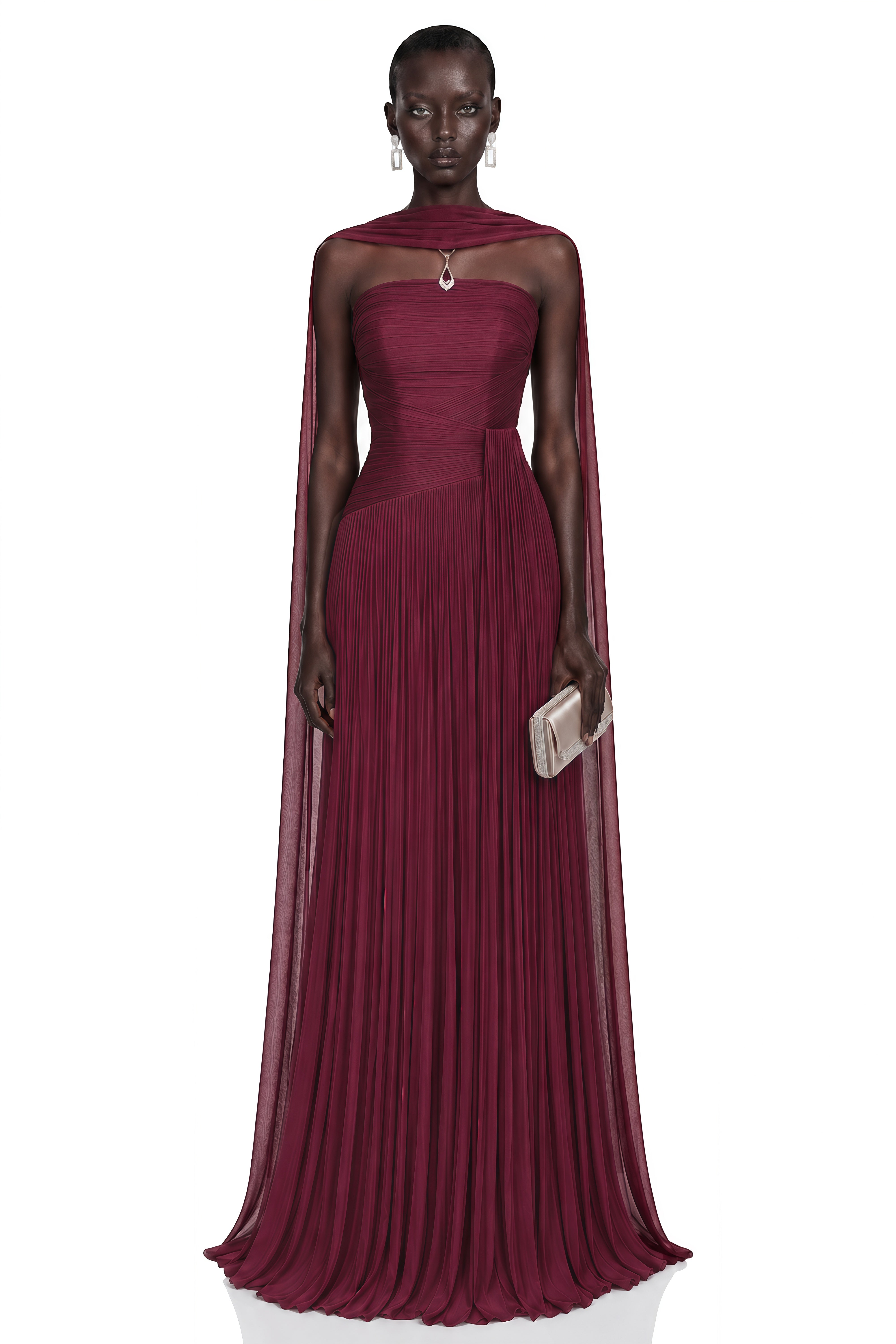 Burgundy strapless pleated maxi dress with a matching cape overlay